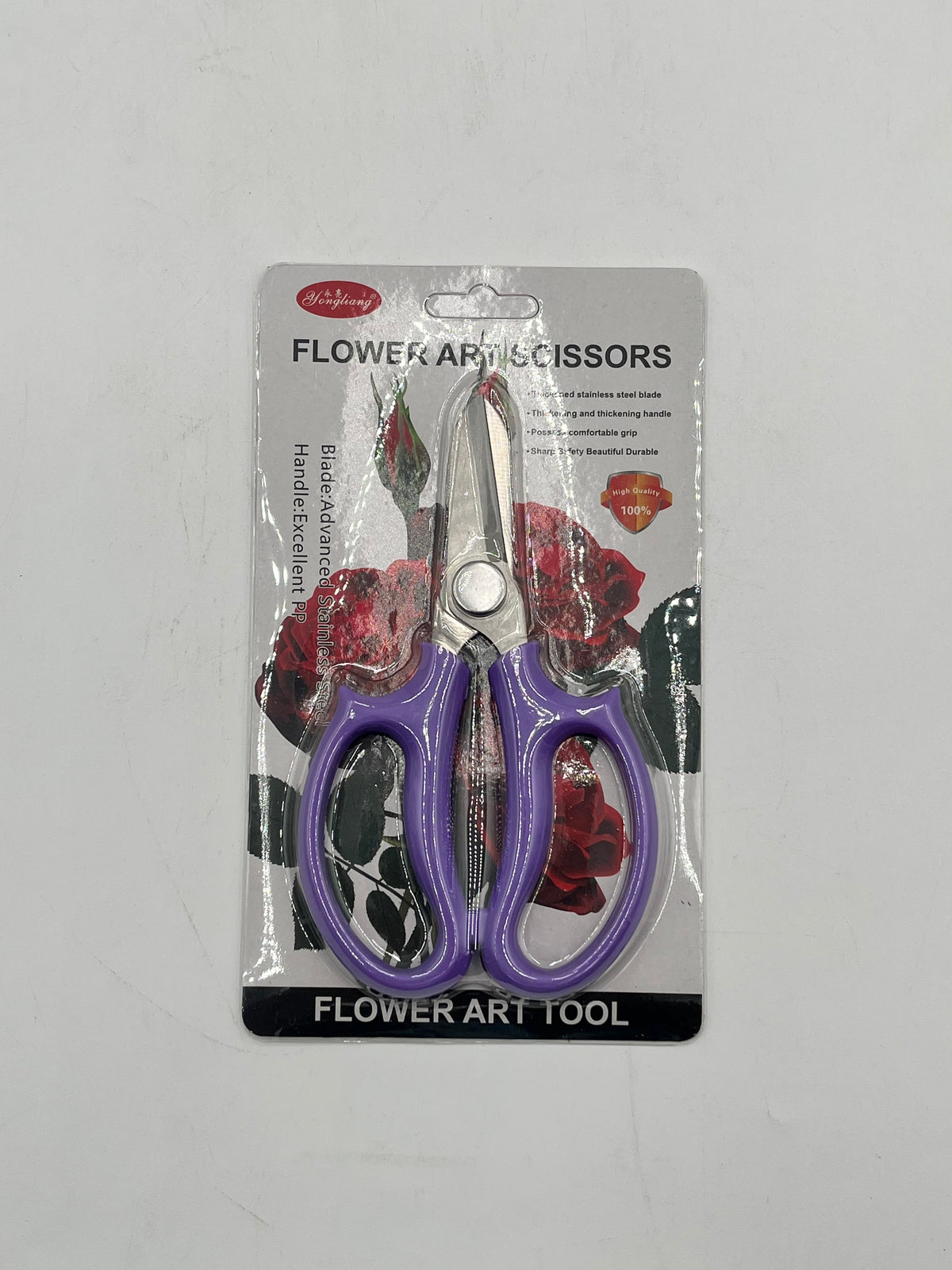 6.5" flower art scissors with stainless steel blades & ergonomic handle in purple. Sold for $7.99 retail by floralsuppliespoint1.com.