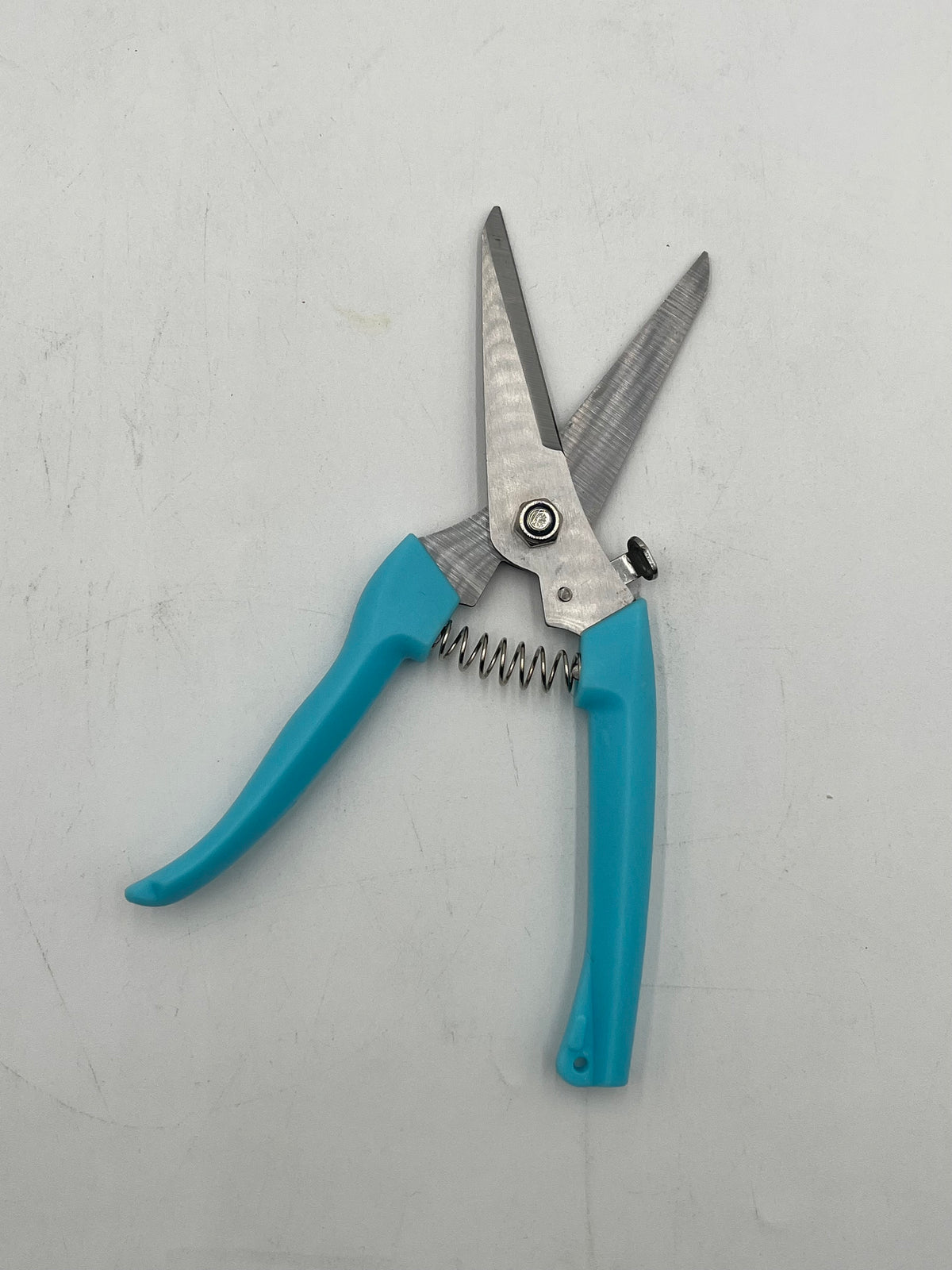 7.5" stainless steel floral pruning shears with spring and safety lock for precise stem cutting. $7.99 retail at floralsuppliespoint1.com.