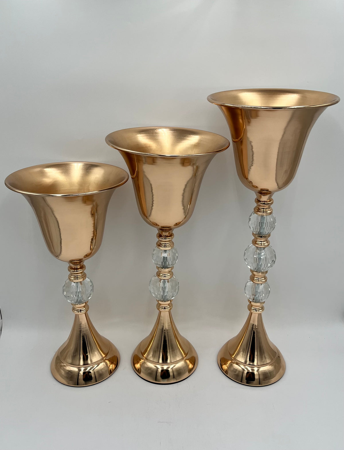 CrystalFlare Trumpet Vase Collection in gold with crystal accents in three sizes for floral displays or décor. Sold individually or as a set at floralsuppliespoint1.com.