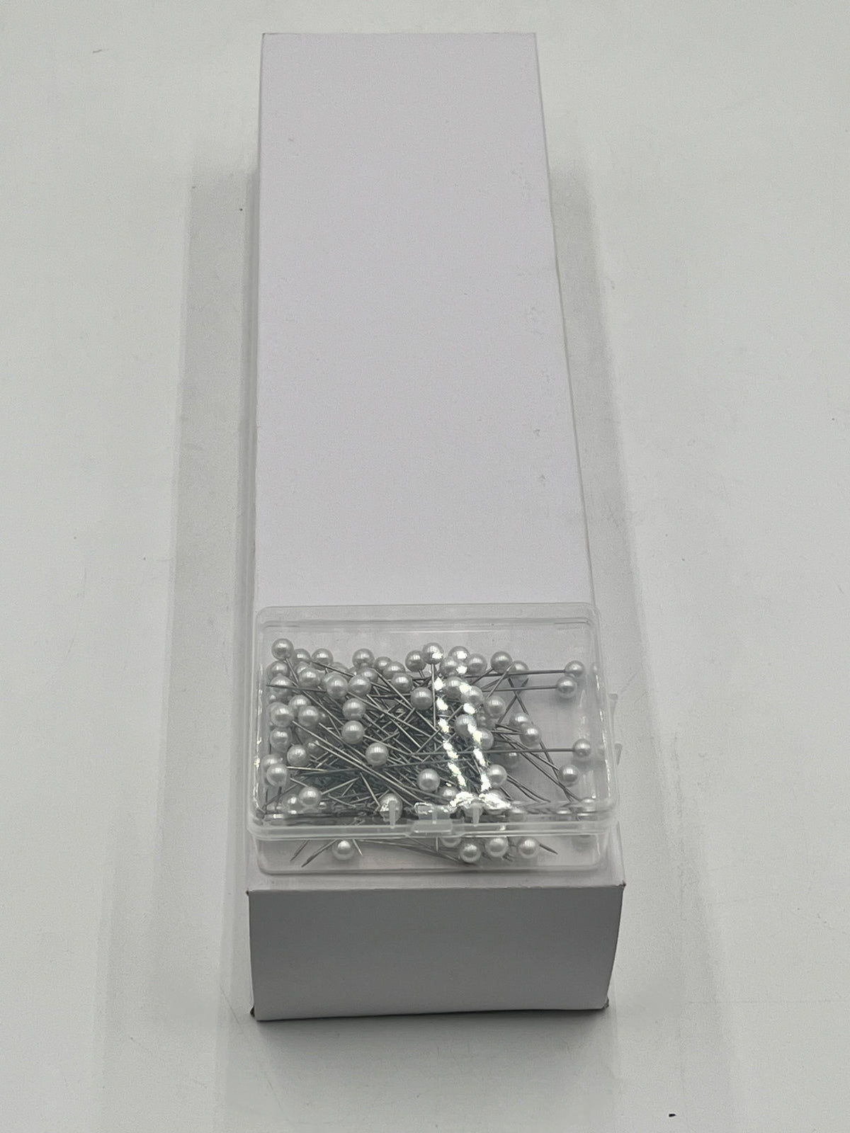 Decorative floral pins in pearl white, pink & diamond crystal styles, 50 pcs per box. Sold retail or wholesale 10-packs by floralsuppliespoint1.com