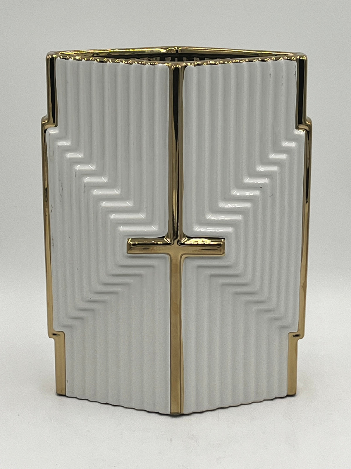 A cross-embossed ceramic vase in white with gold detailing, measuring 11" x 7.5" and weighing 4.40 lbs, available at floralsuppliespoint1.com.