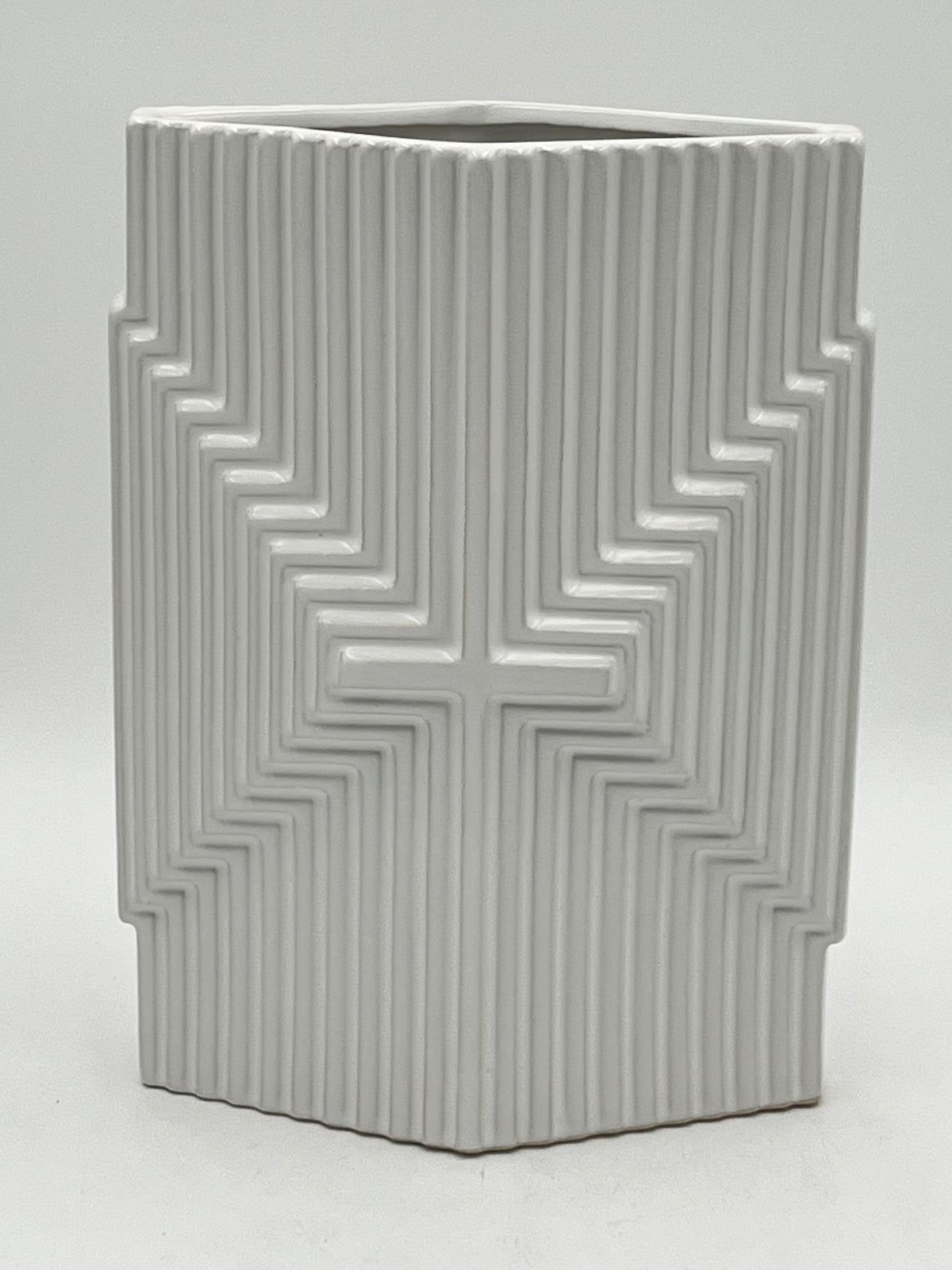 Eternal Grace Matte Edition ceramic vases in matte white with raised cross pattern, sold by floralsuppliespoint1.com for elegant floral tributes or modern decor.