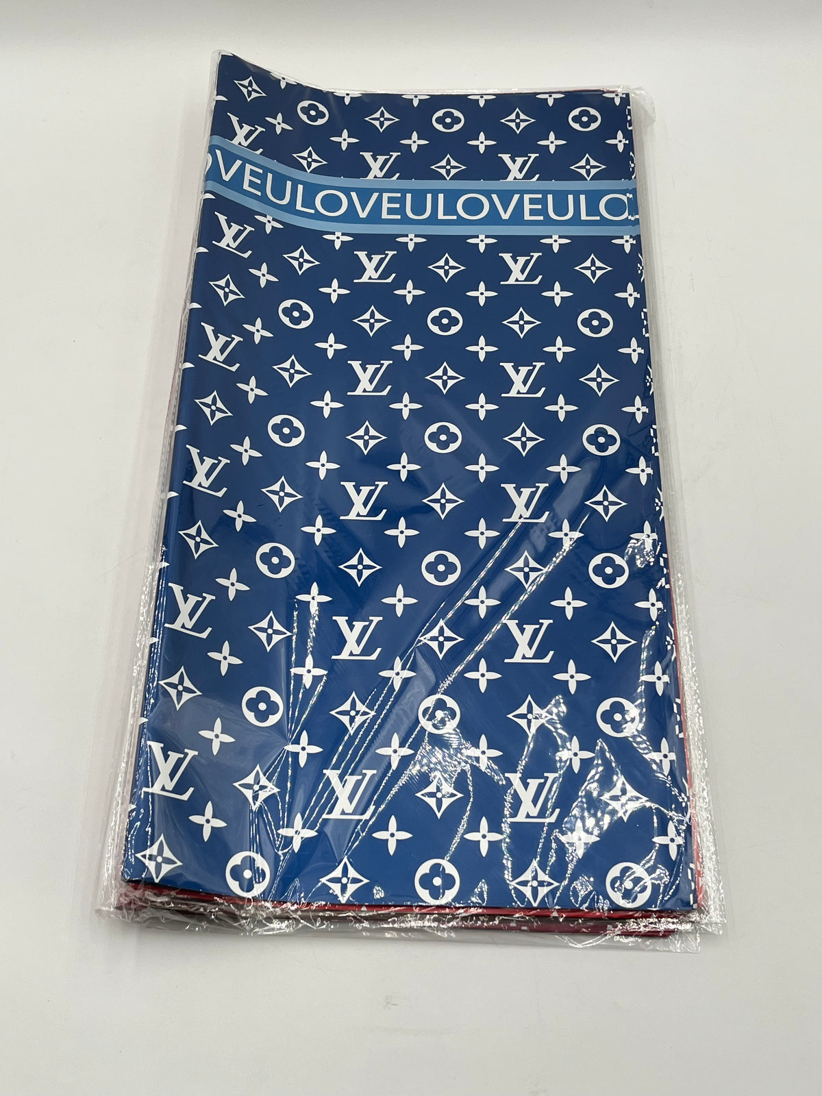 LOVEU LV Luxe Set wrapping paper in Blue with iconic LV monogram. 20 sheets of 22"x22", Sold by floralsuppliespoint1.com for $9.99