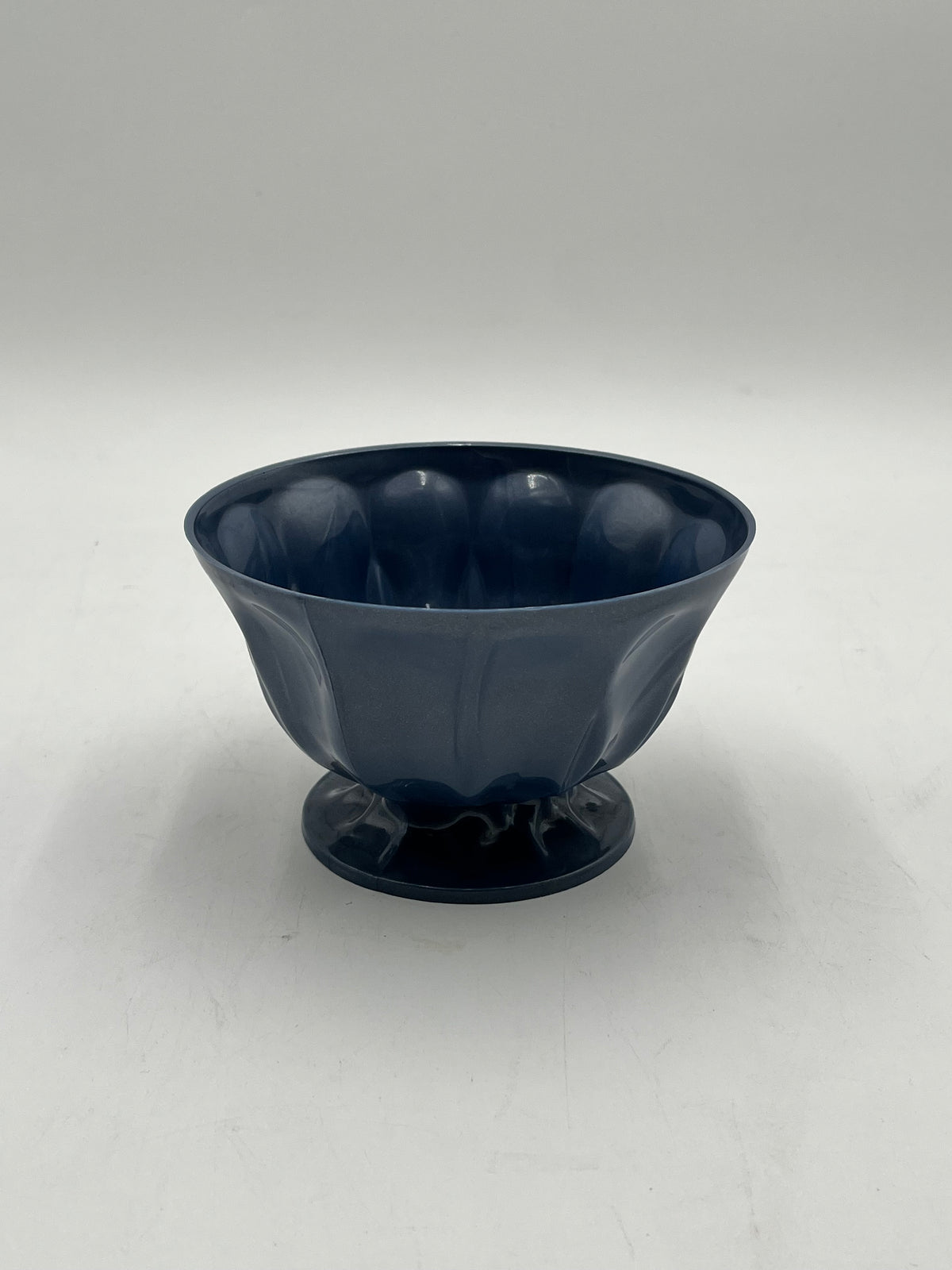 A pastel pedestal bowl in blue. Perfect 4x6 floral base for décor or sympathy tributes. Available @ floralsuppliespoint1.com for $5.99 each