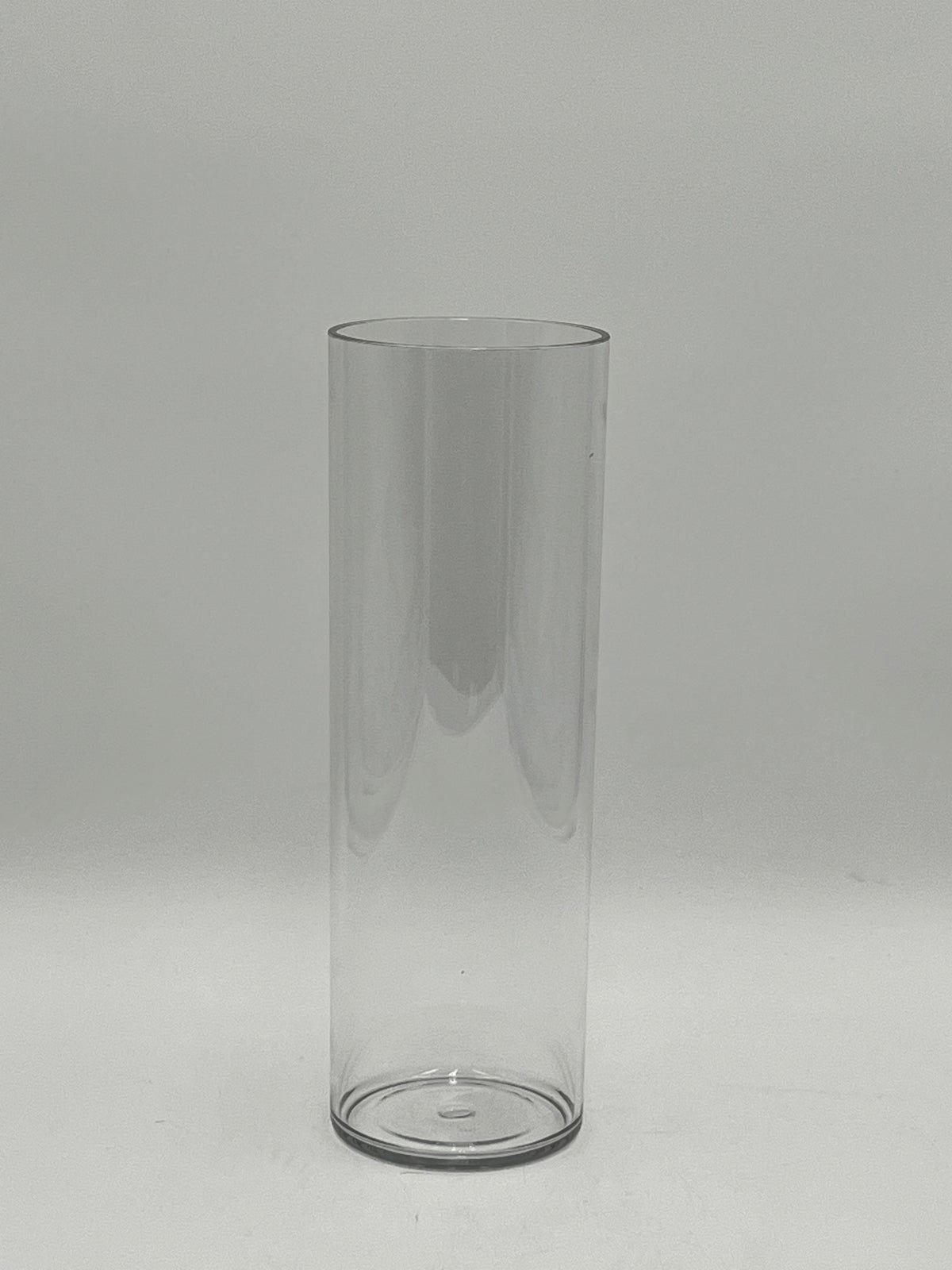 Clear plastic cylinder vases in four sizes for floral design, candles, or decor use. Lightweight and modern. Sold individually by floralsuppliespoint1.com.