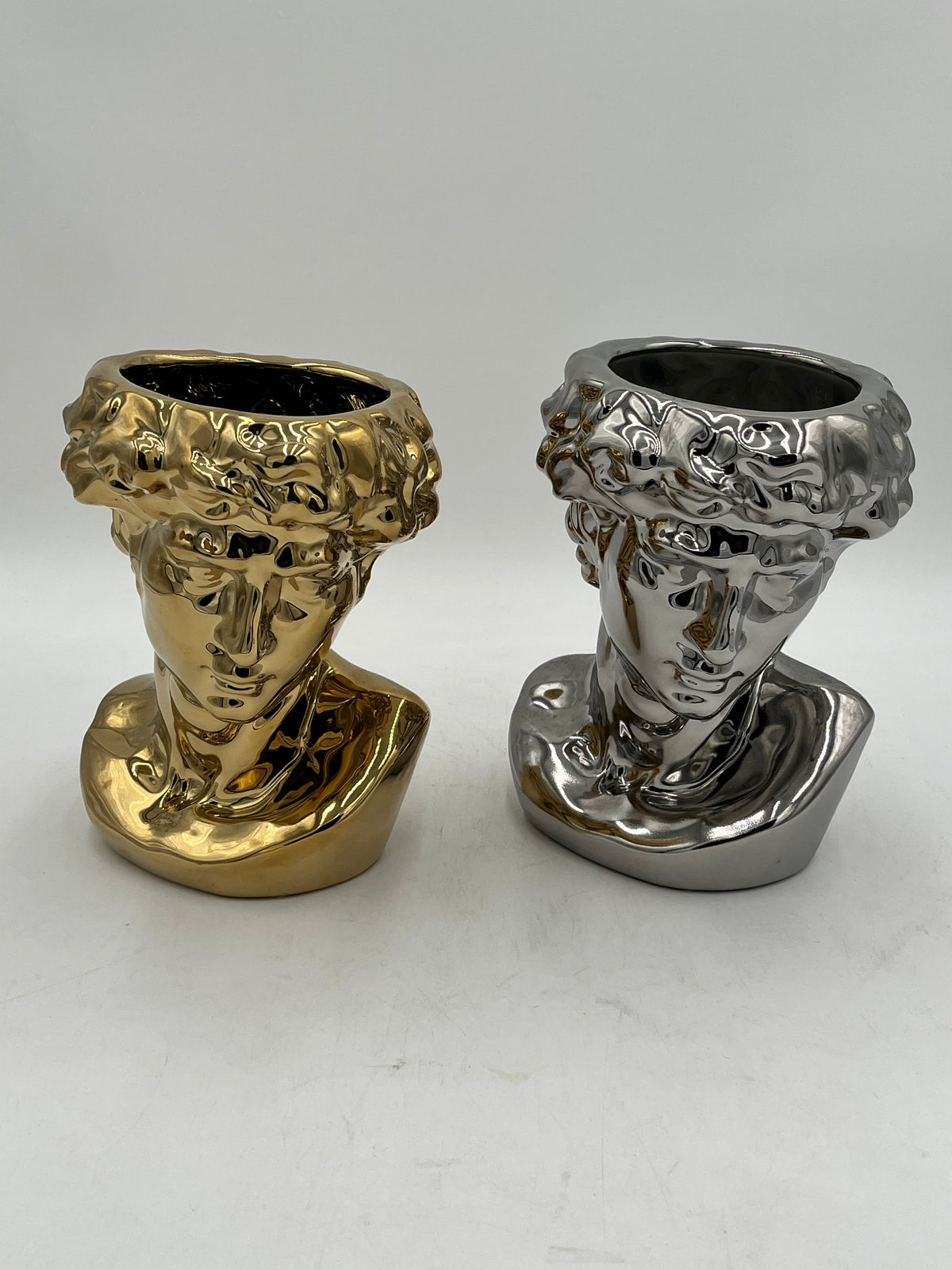 Gold and silver ceramic bust vases with reflective finish, titled Apollo Gaze — modern artistic décor sold by floralsuppliespoint1.com for $14.99 each