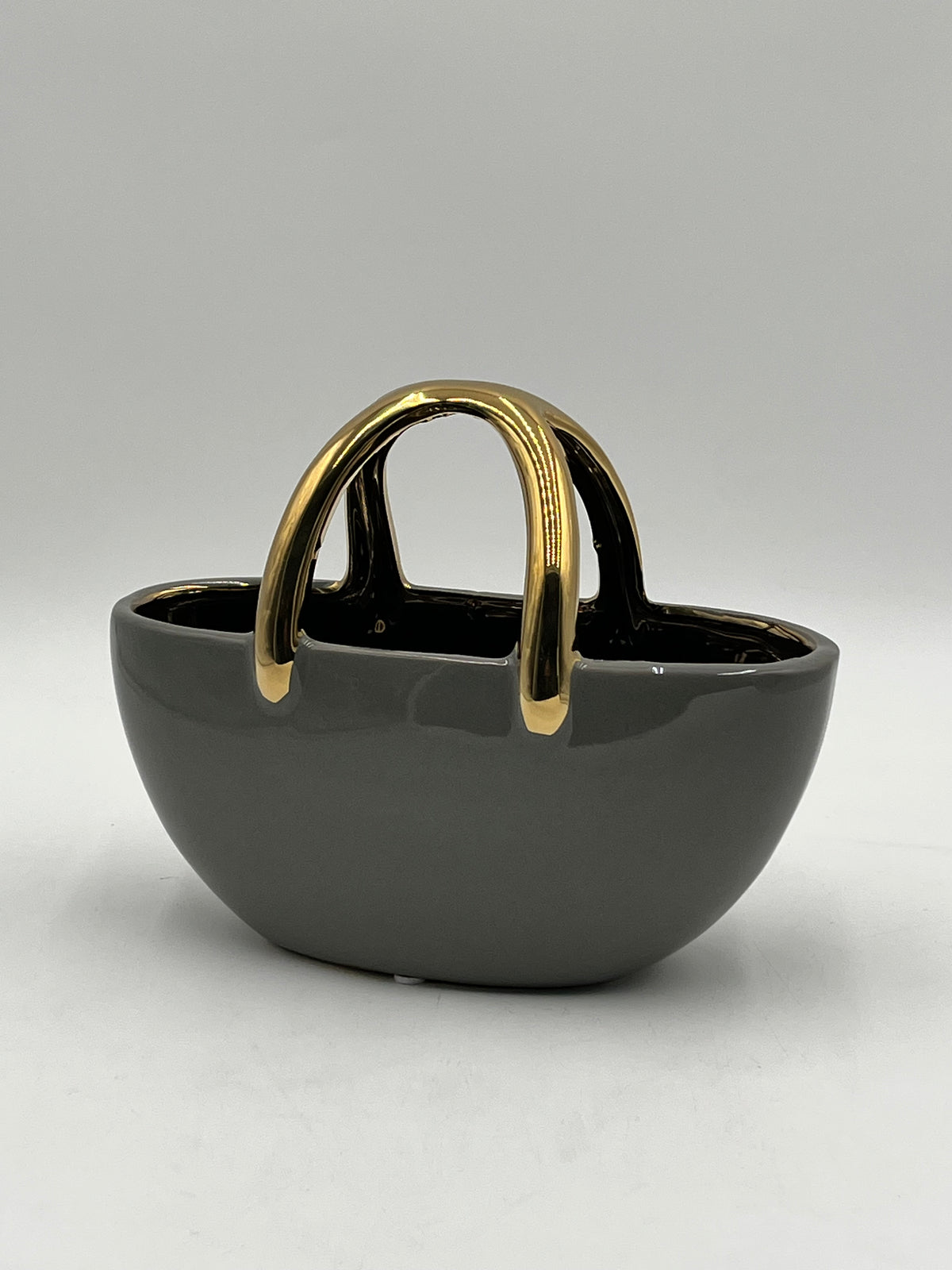 The Arcora series of vases are sculptural ceramic objects that transcends traditional form 7x8.5 Op, sold by floralsuppliespoint1.com