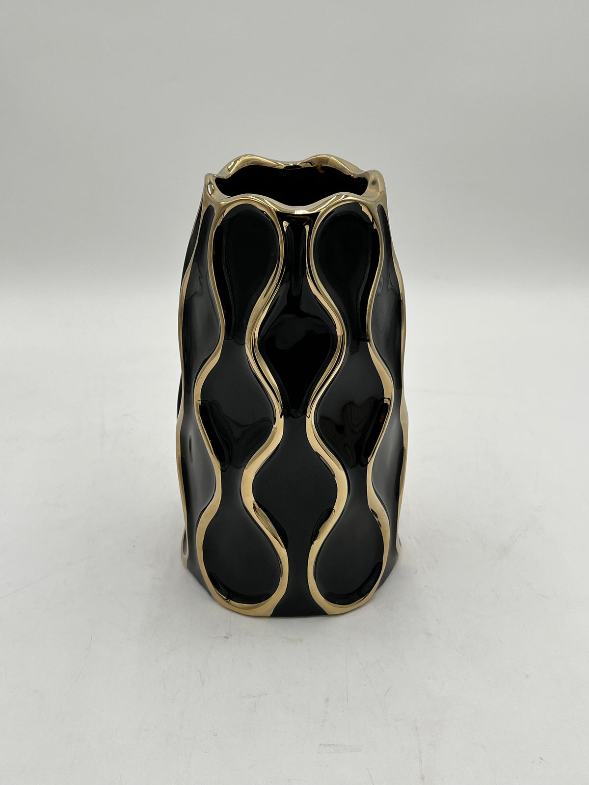 Auric Wave ceramic vases in black & white with gold wave detailing. Elegant décor accent pieces available in 5 sizes & sold by floralsuppliespoint1.com.