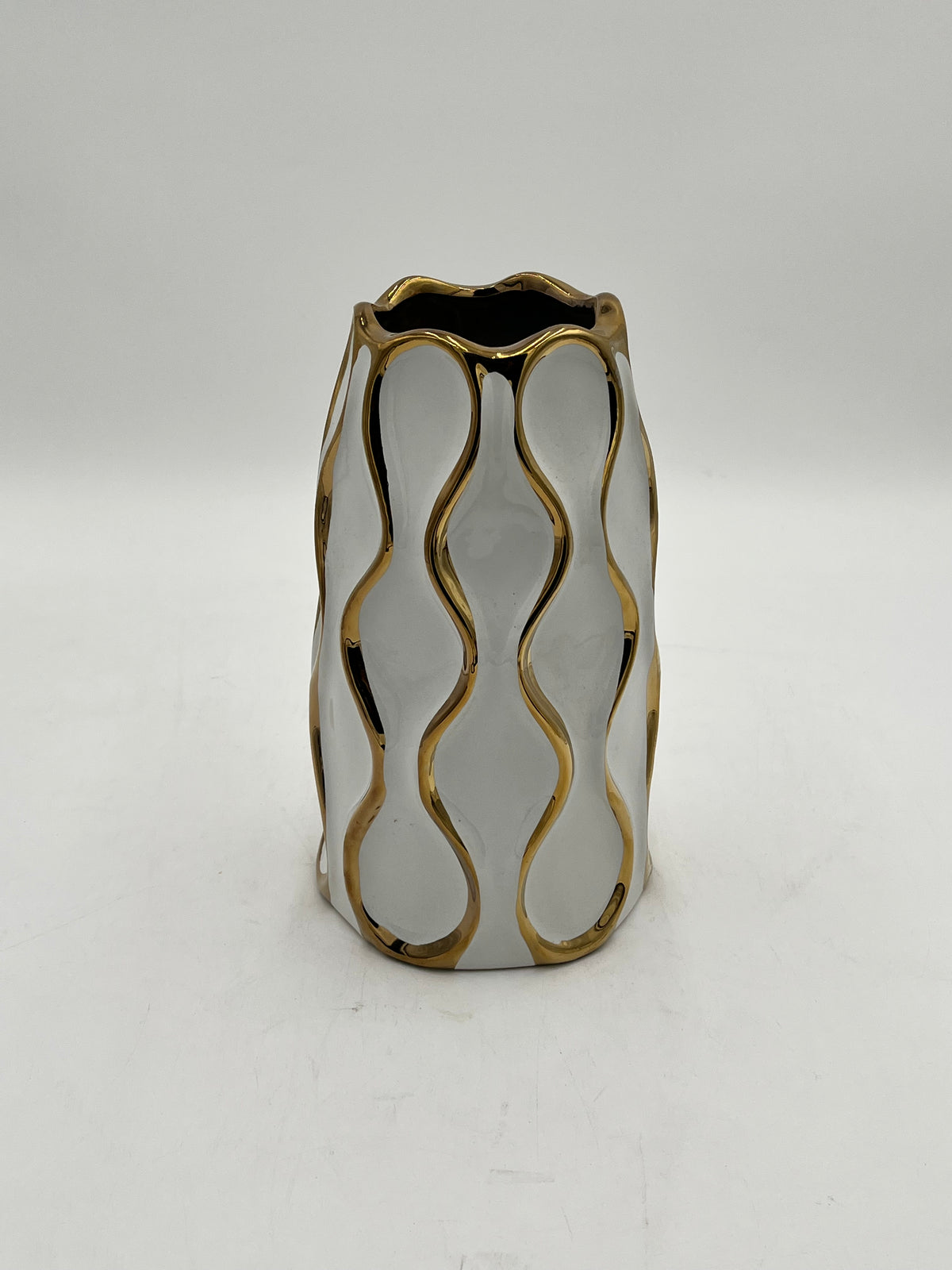 Auric Wave ceramic vases in black & white with gold wave detailing. Elegant décor accent pieces available in 5 sizes & sold by floralsuppliespoint1.com.