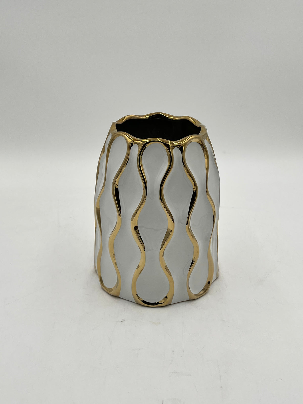 Auric Wave ceramic vases in black & white with gold wave detailing. Elegant décor accent pieces available in 5 sizes & sold by floralsuppliespoint1.com.