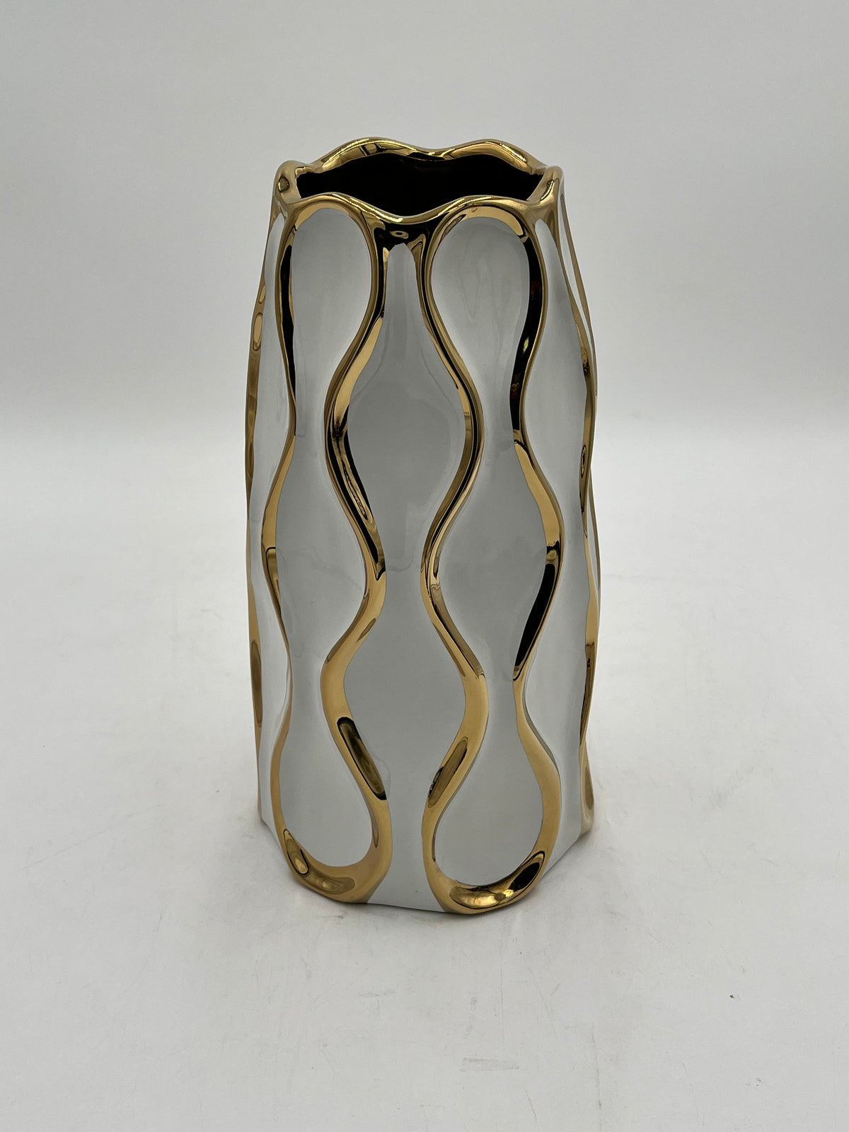 Auric Wave ceramic vases in black & white with gold wave detailing. Elegant décor accent pieces available in 5 sizes & sold by floralsuppliespoint1.com.