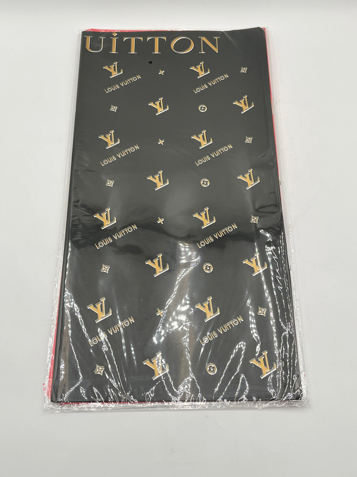 Enhance gifting with the Couture LV Collection. 20 luxury wrapping sheets (22x22) in black. $9.99 per pack, Sold by floralsuppliespoint1.com