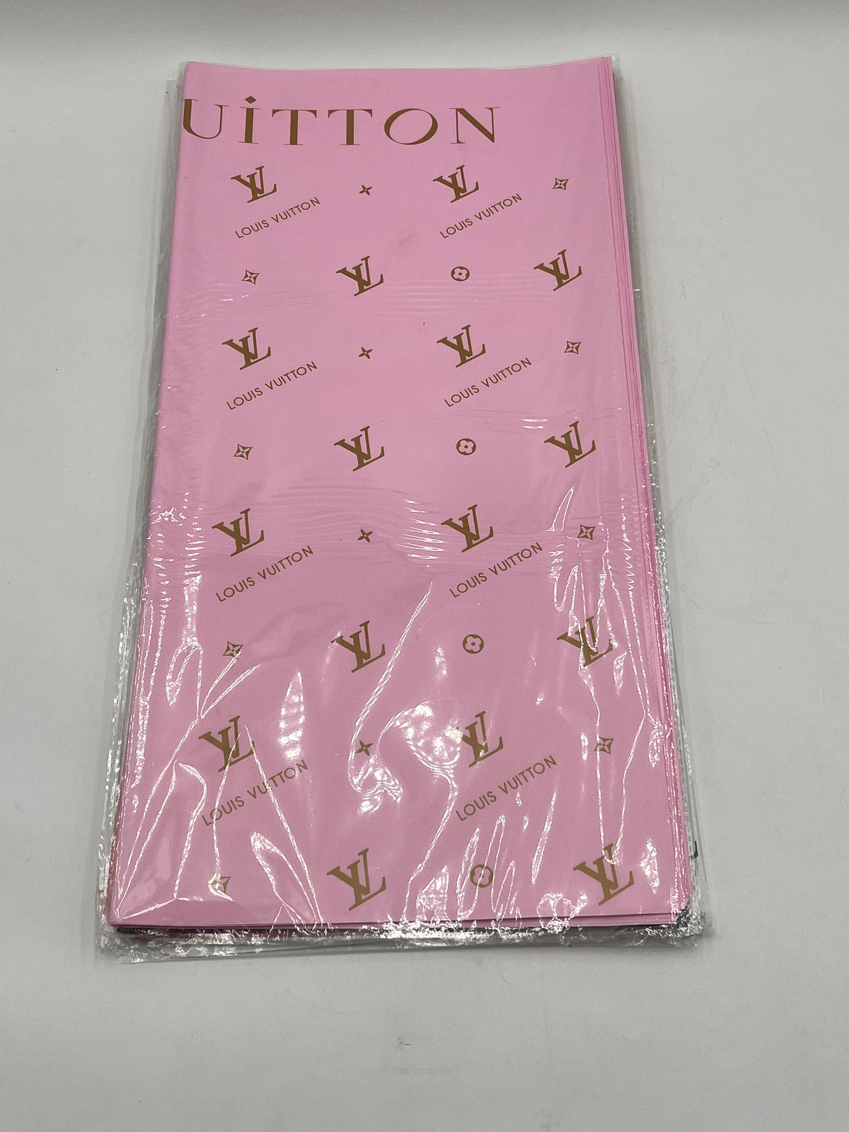 Enhance gifting with the Couture LV Collection. 20 luxury wrapping sheets (22x22) in pink. $9.99 per pack, Sold by floralsuppliespoint1.com