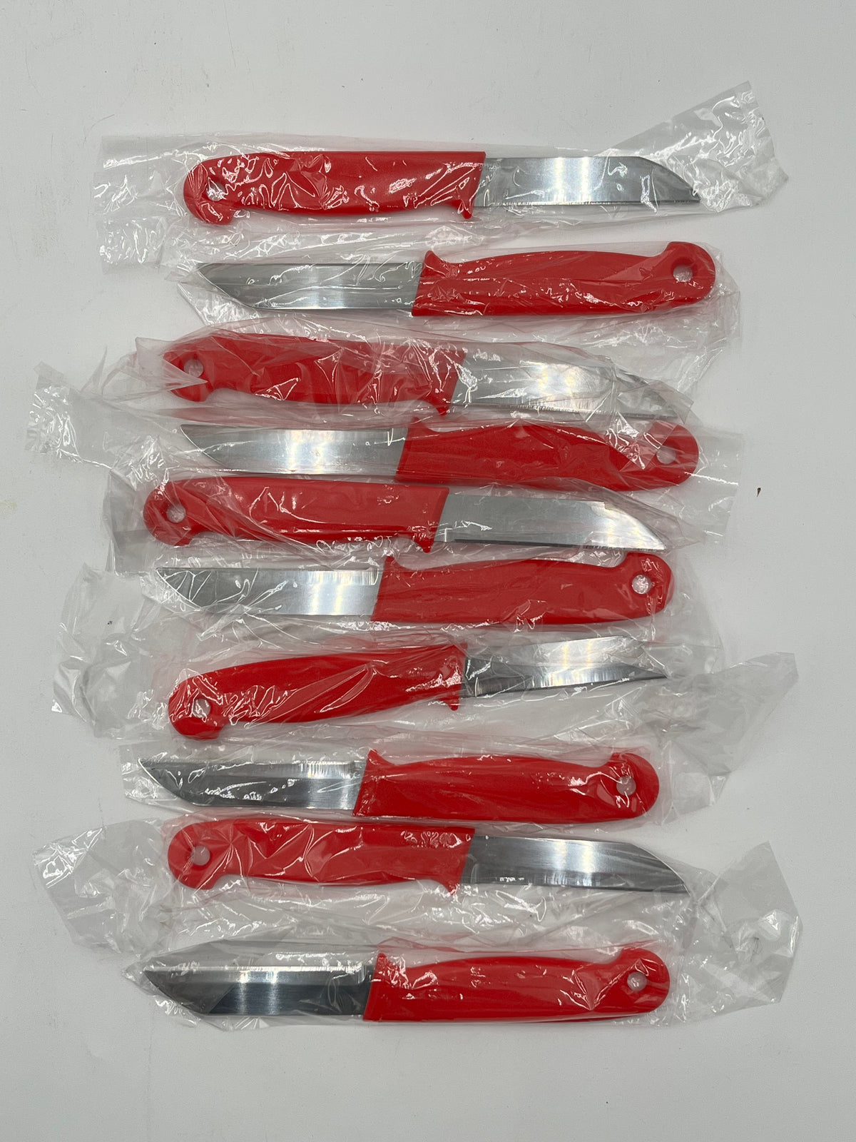 Craft & Floral Knives with a red handle, sold in packs of 10 by floralsuppliespoint1.com.