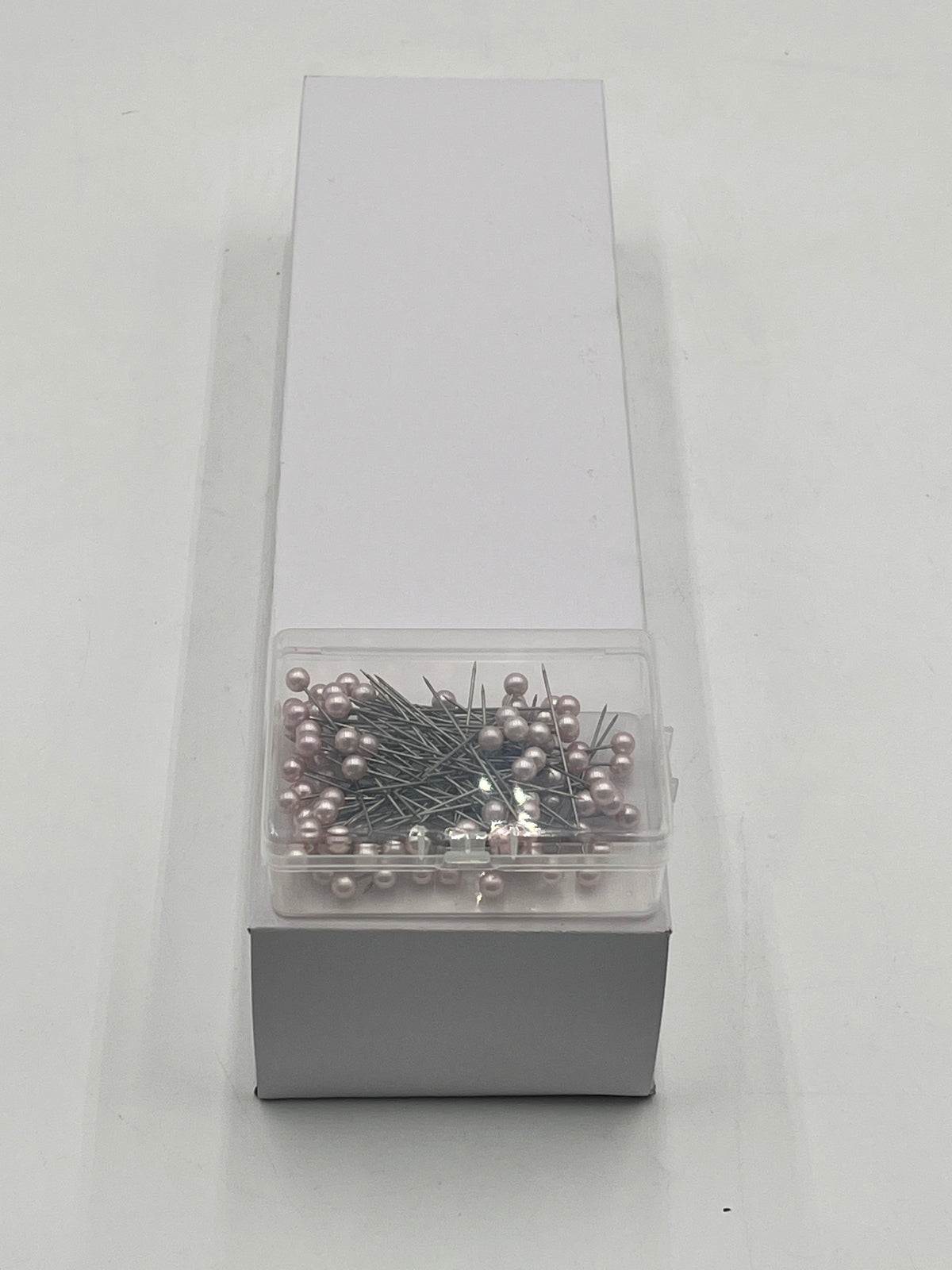 Decorative floral pins in pearl white, pink & diamond crystal styles, 50 pcs per box. Sold retail or wholesale 10-packs by floralsuppliespoint1.com