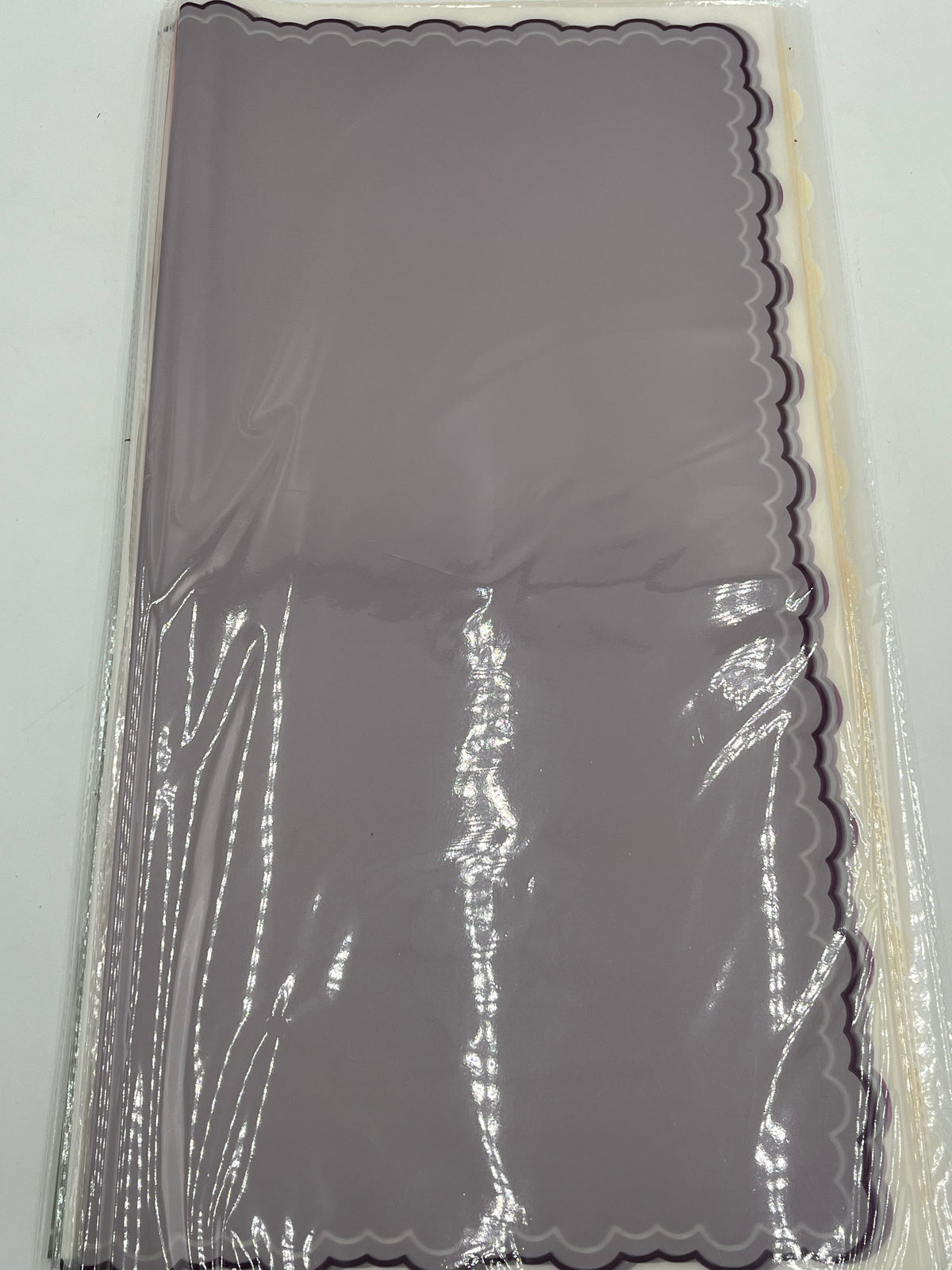 Lavender elegant scalloped wrapping paper, 22 in x 22 in, packs of 20 for $9.99. Perfect for flowers, gifts & crafts, sold by floralsuppliespoint1.com