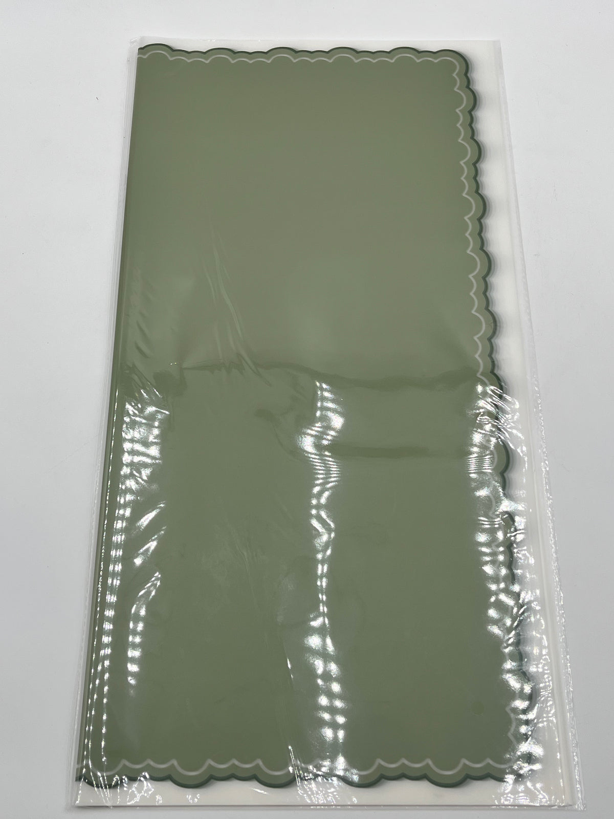 Olive Green elegant scalloped wrapping paper, 22 in x 22 in, packs of 20 for $9.99. Perfect for flowers, gifts & crafts, sold by floralsuppliespoint1.com