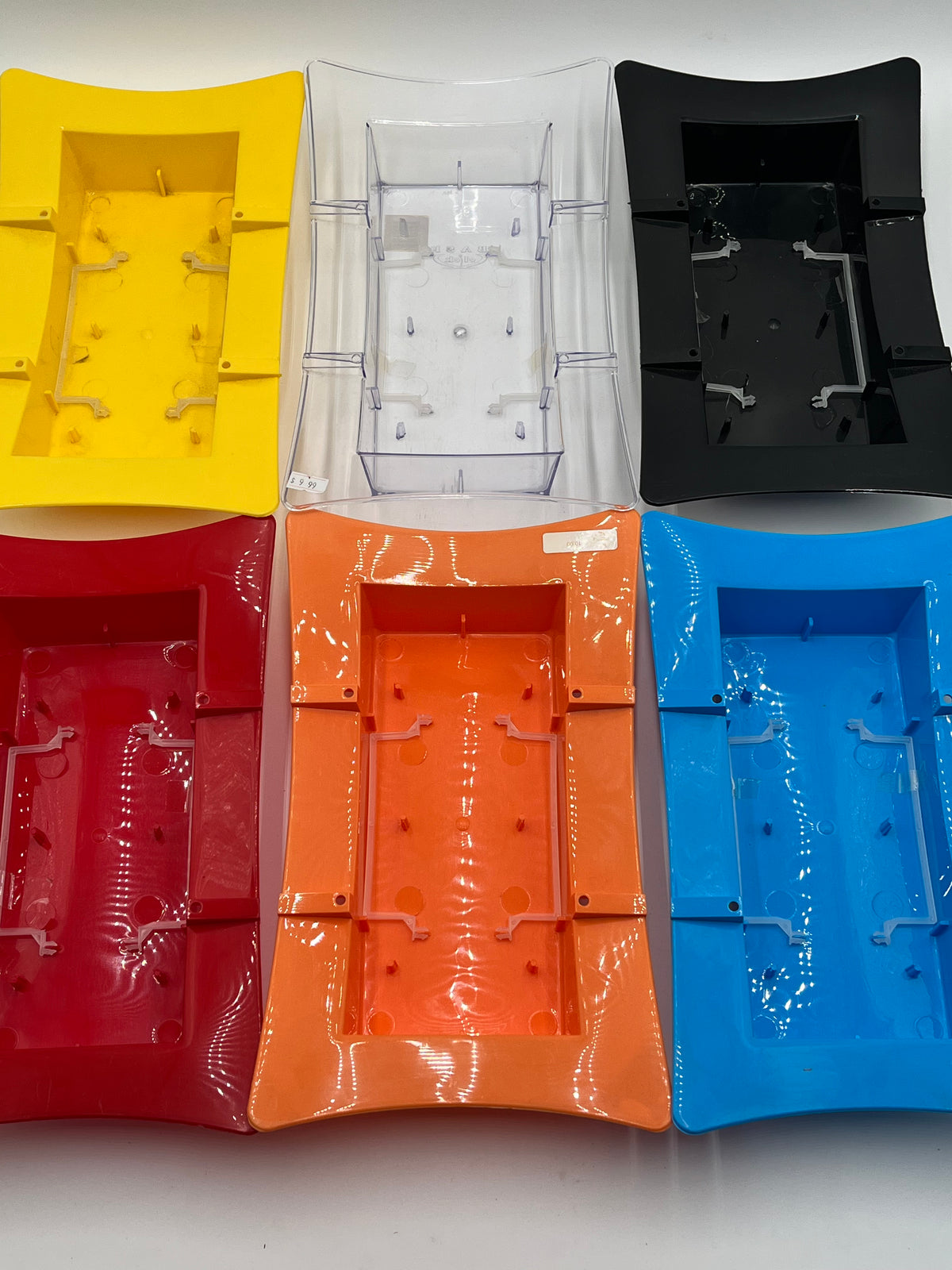 FoamLock Floral Trays in 6 bold colors-13" base fits full floral foam brick with built-in foam clip. Durable & reusable trays for $9.99 @ floralsuppliespoint1.com
