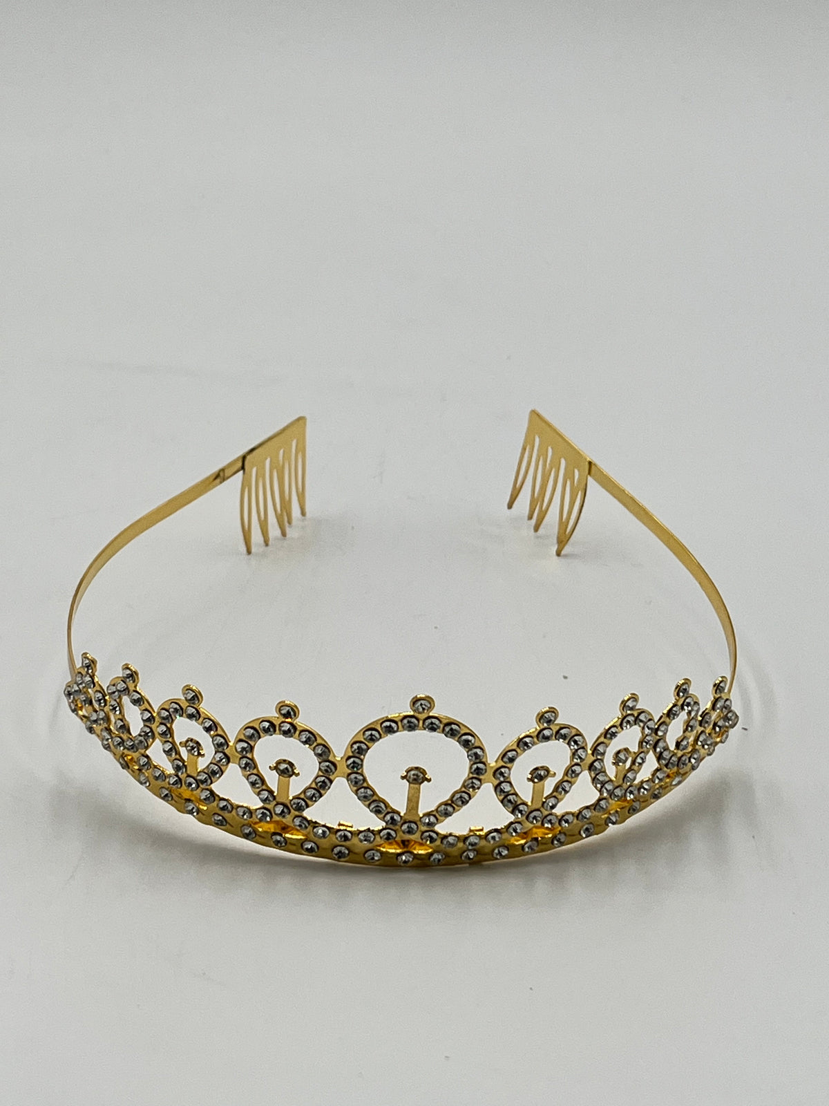 Royal Crystal Tiara Headband in gold sold retail & wholesale by floralsuppliespoint1.com. Ideal for birthdays & celebrations.