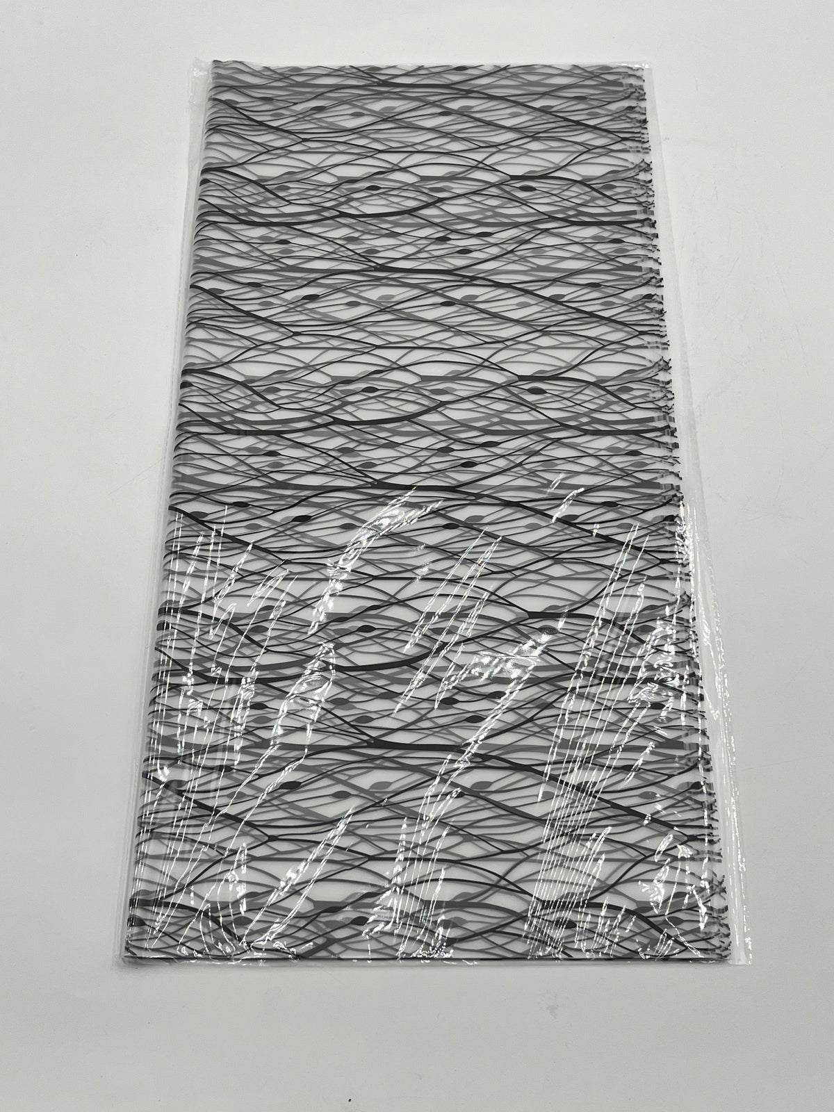 Gossamer Luxe Set– 22x22” web-pattern floral wrapping sheets in Black. Elegant, modern & sold in packs of 20 for $9.99 by floralsuppliespoint1.com