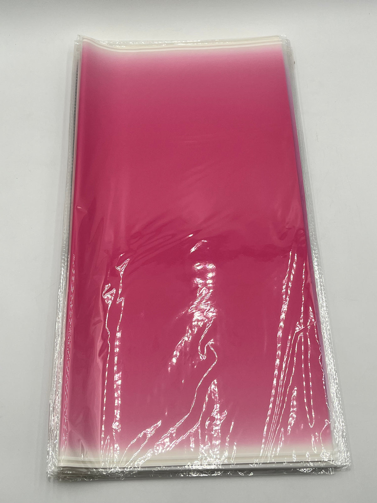 Gradient wrapping sheets for floral bouquets, gift packaging & DIY gifting in Hot Pink, 20x20 inches & available at floralsuppliespoint1.com for $9.99