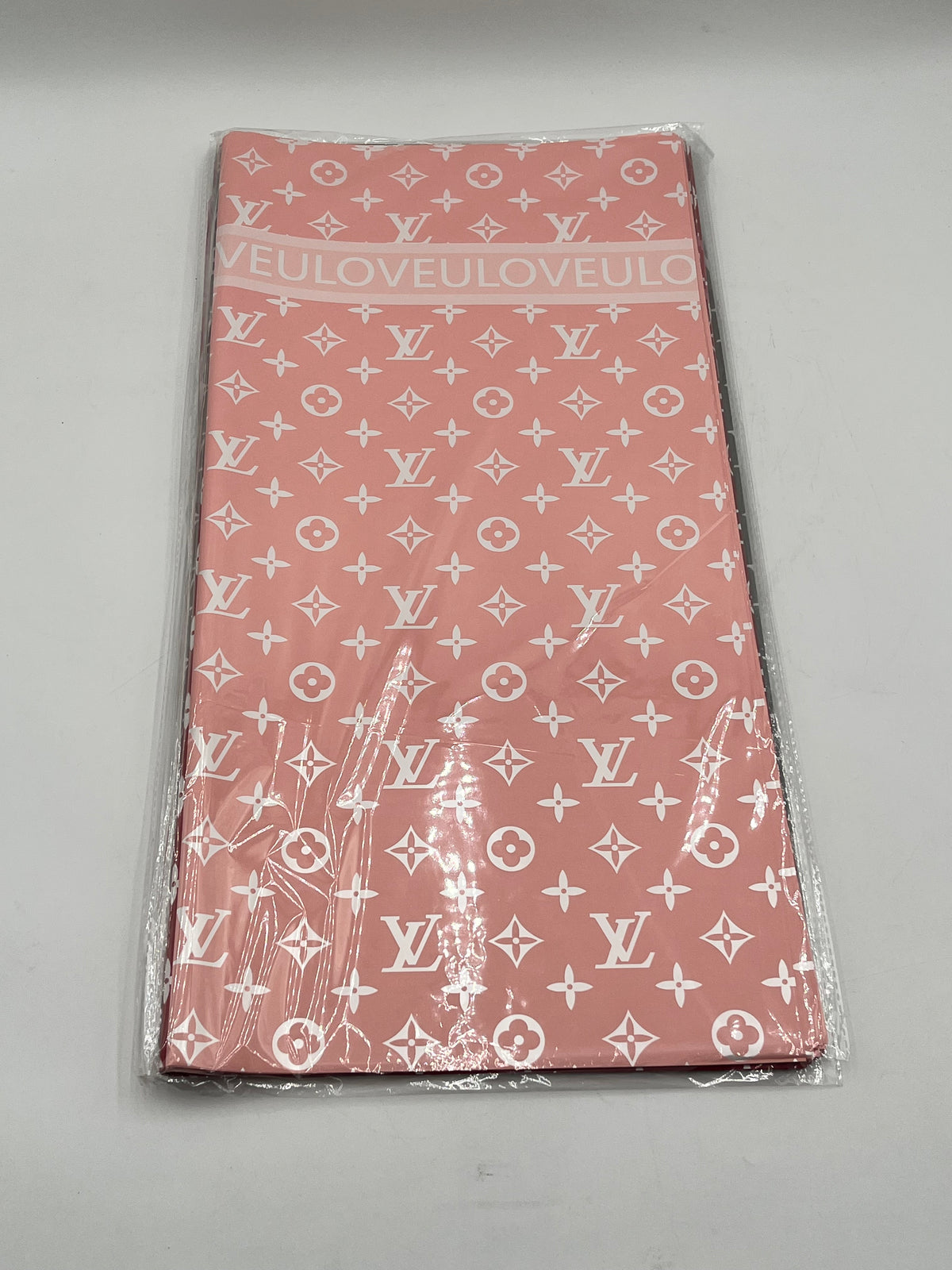 LOVEU LV Luxe Set wrapping paper in Peach with iconic LV monogram. 20 sheets of 22"x22", Sold by floralsuppliespoint1.com for $9.99