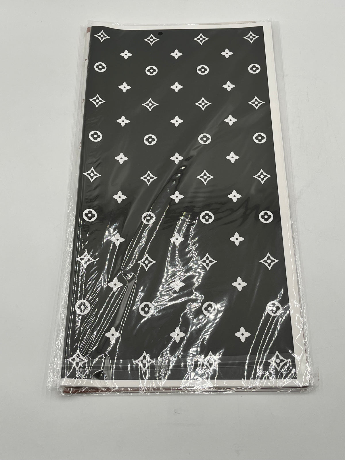 LV Luxe Monogram Edition wrapping sheets in Black, 22x22" (20 sheets) for floral & gift use. Sold by floralsuppliespoint1.com for $9.99