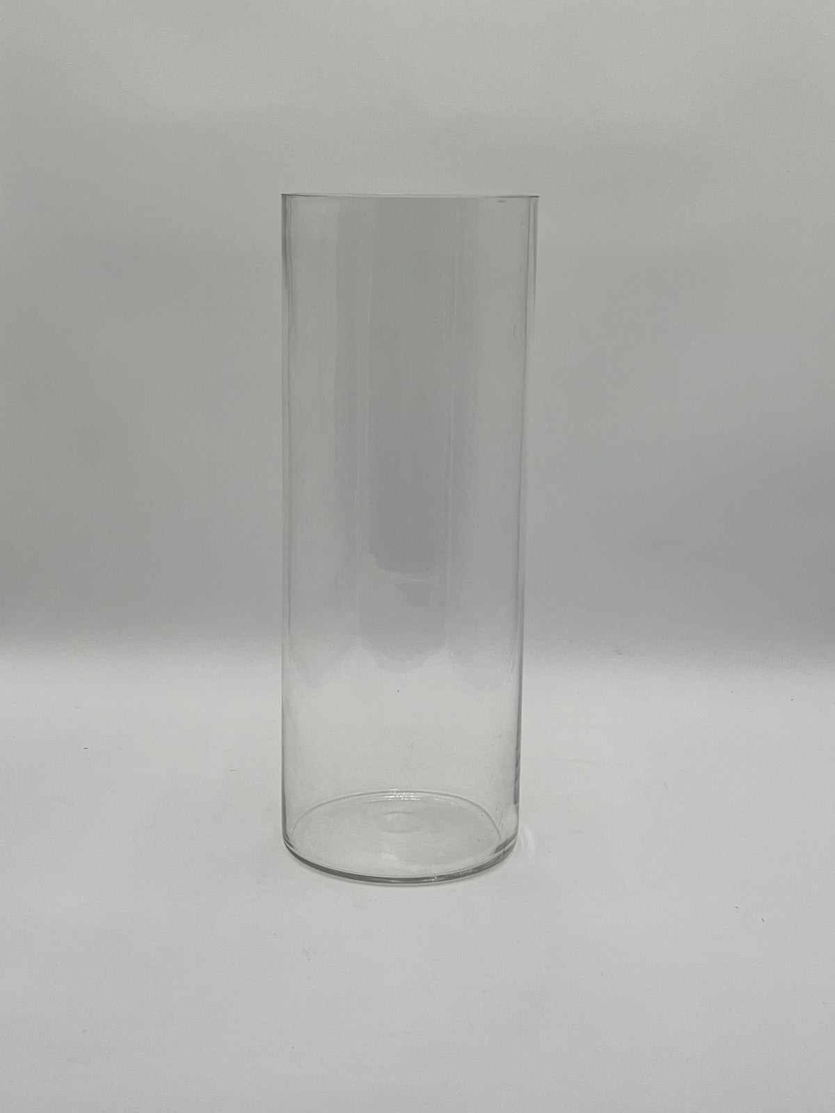 The LuxeGlass Cylinder Collection are clear glass cylinder vases in four sizes, ideal for floral designs, candles, or events. Sturdy, elegant, and sold individually by floralsuppliespoint1.com.