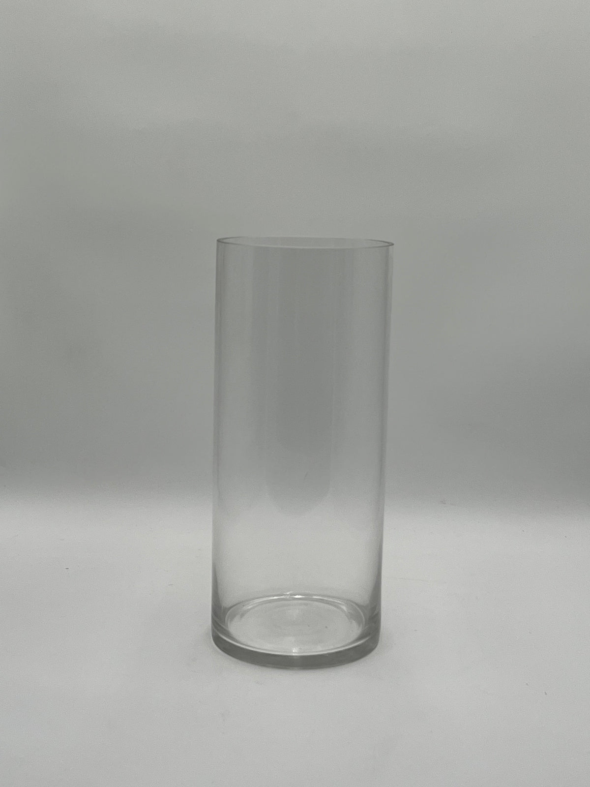 The LuxeGlass Cylinder Collection are clear glass cylinder vases in four sizes, ideal for floral designs, candles, or events. Sturdy, elegant, and sold individually by floralsuppliespoint1.com.
