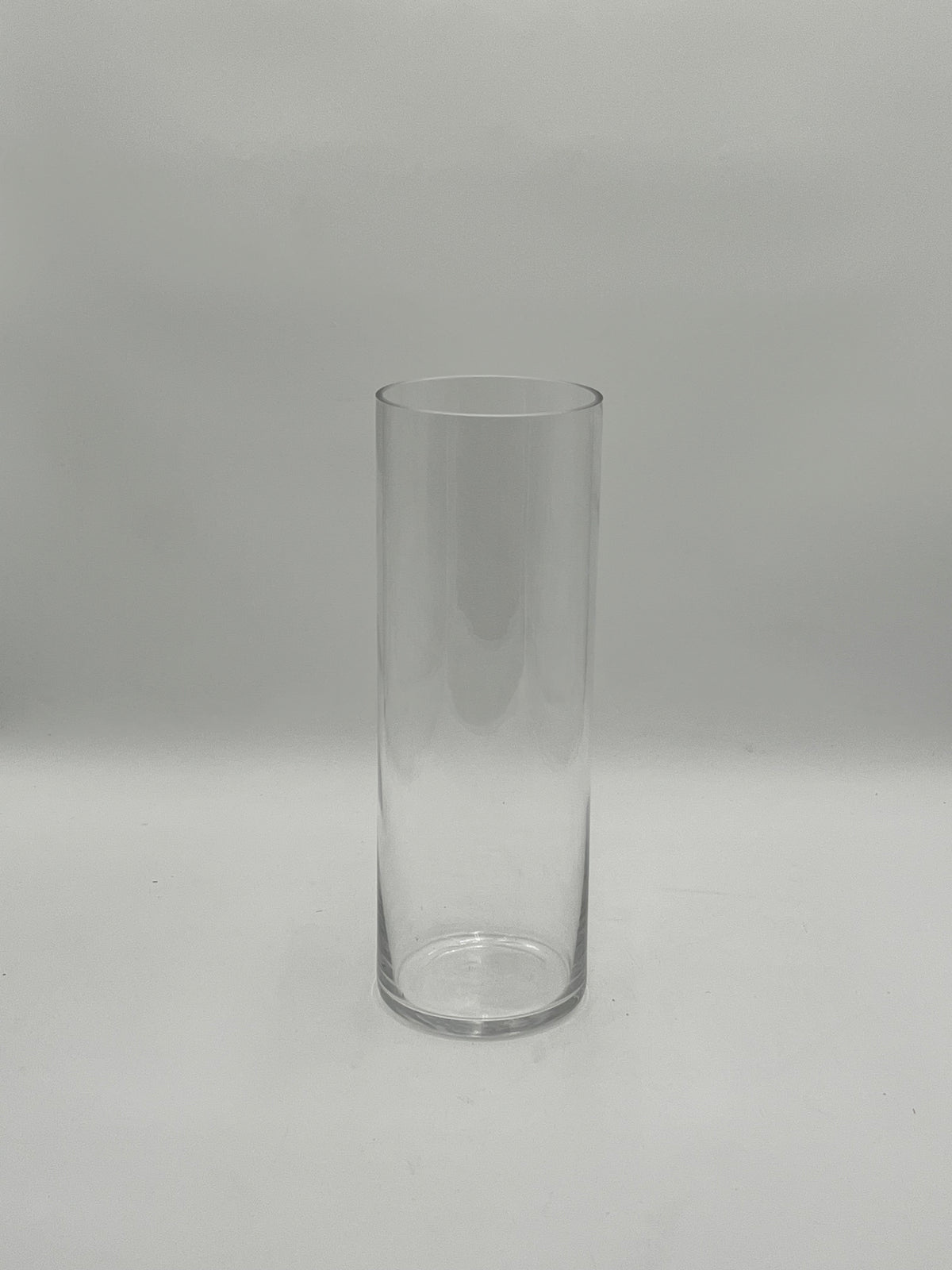 The LuxeGlass Cylinder Collection are clear glass cylinder vases in four sizes, ideal for floral designs, candles, or events. Sturdy, elegant, and sold individually by floralsuppliespoint1.com.