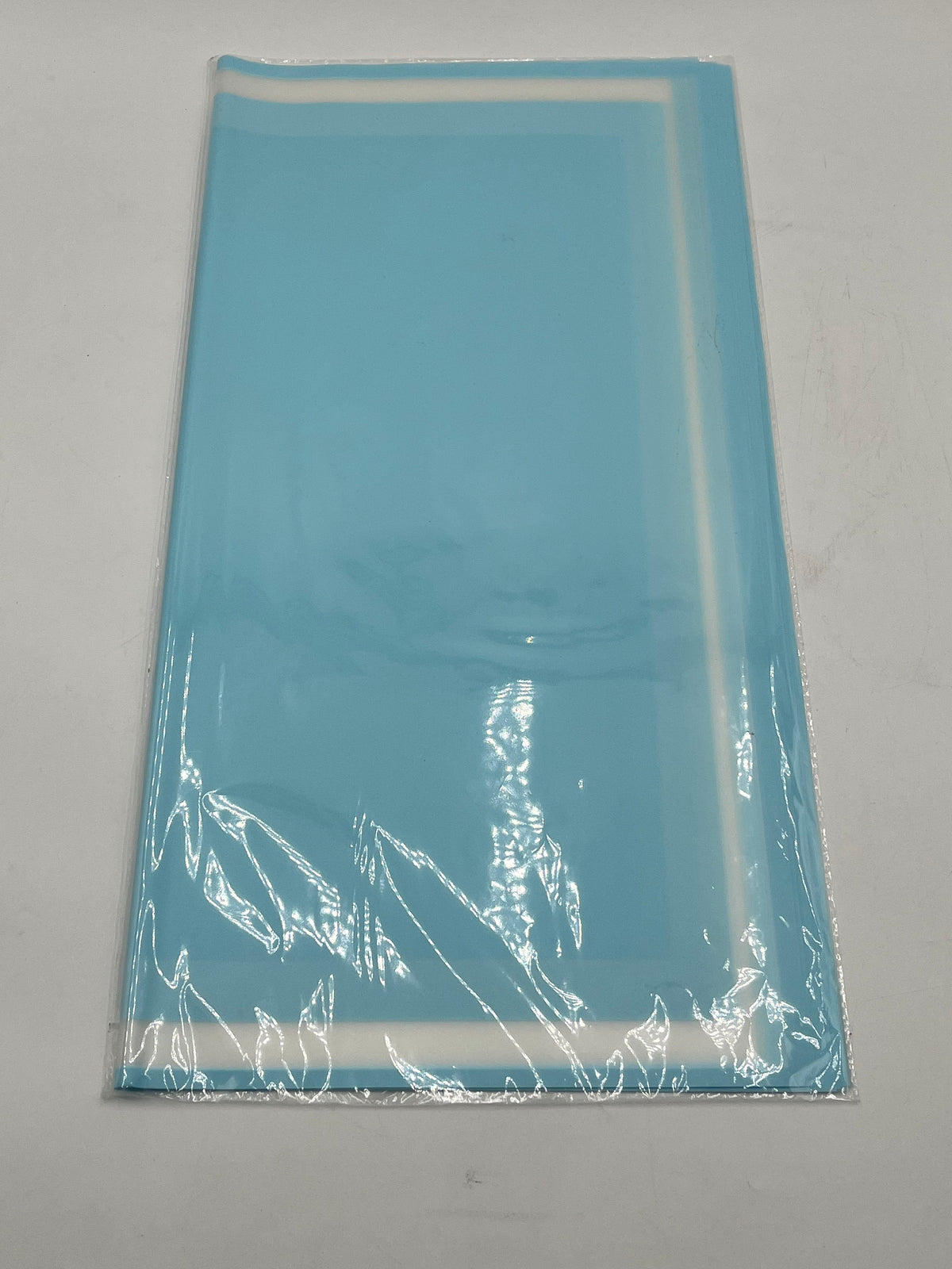 Elegant floral wraps with bold white trim. The Opaline Edge Set in Baby Blue, 22x22", 20 sheets. Sold by floralsuppliespoint1.com for $9.99