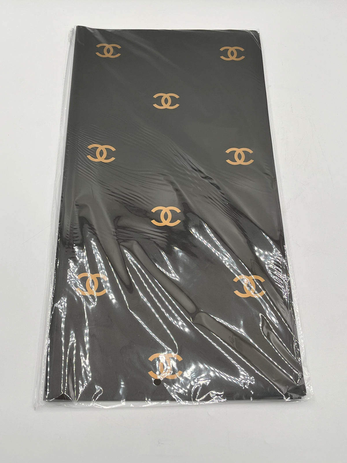 Paris Luxe CC Collection– in black, designer-inspired wrapping papers with gold & black logos. 20 sheet pack for $9.99 each by floralsuppliespoint1.com
