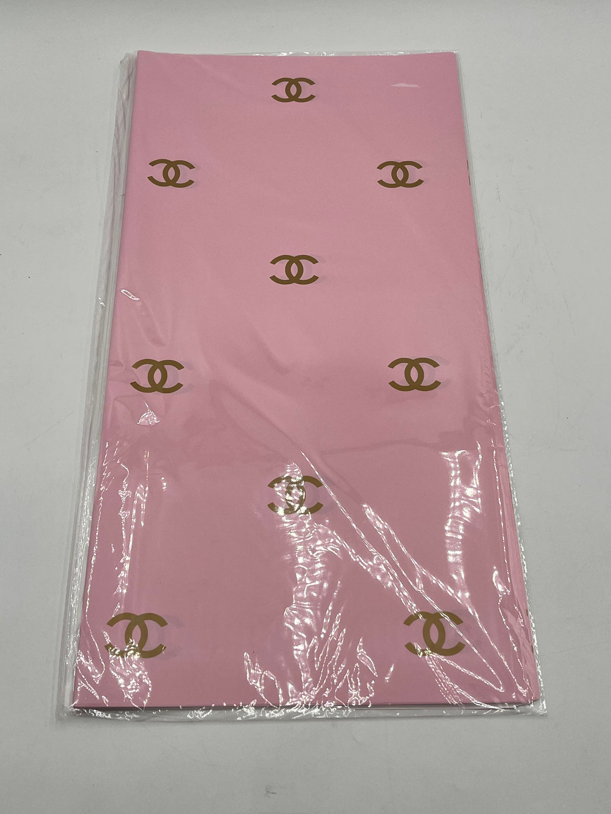 Paris Luxe CC Collection– in pink, designer-inspired wrapping papers with gold & black logos. 20 sheet pack for $9.99 each by floralsuppliespoint1.com