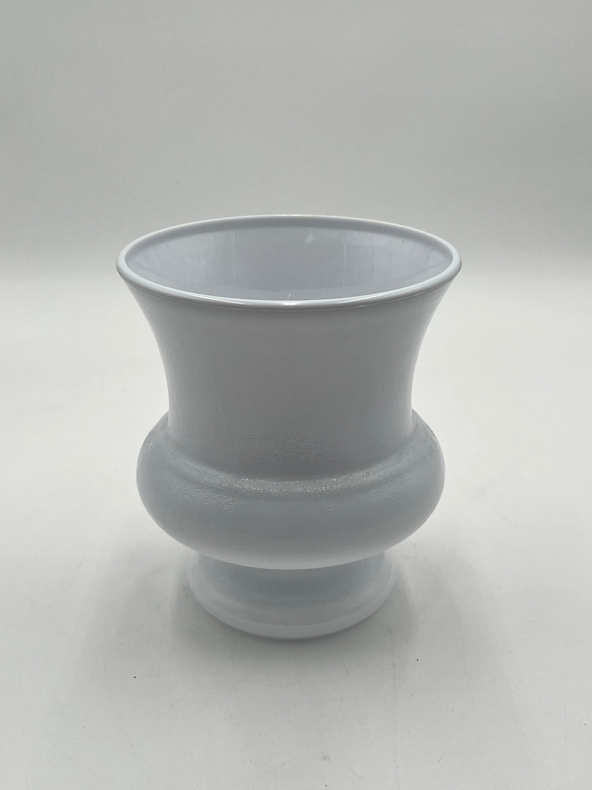 Elegant white plastic urn in medium 8x7 size. Perfect for floral, memorial or décor use. Sold by floralsuppliespoint1.com for $4.99 each.
