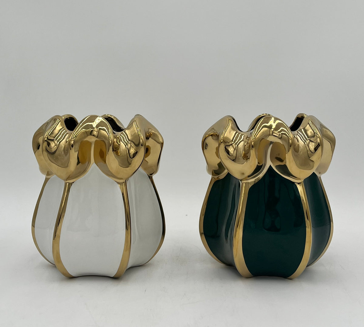 Petal Crest ceramic vases in green and white with gold accents. Elegant floral décor pieces sold by floralsuppliespoint1.com.
