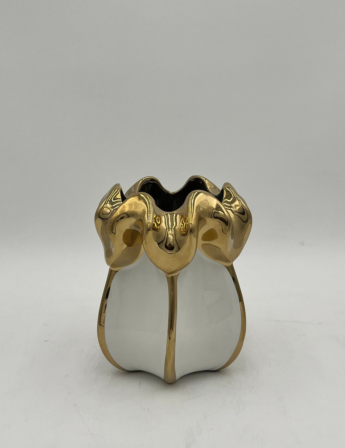 Petal Crest ceramic vase in white with gold accents. Elegant floral décor pieces sold by floralsuppliespoint1.com.