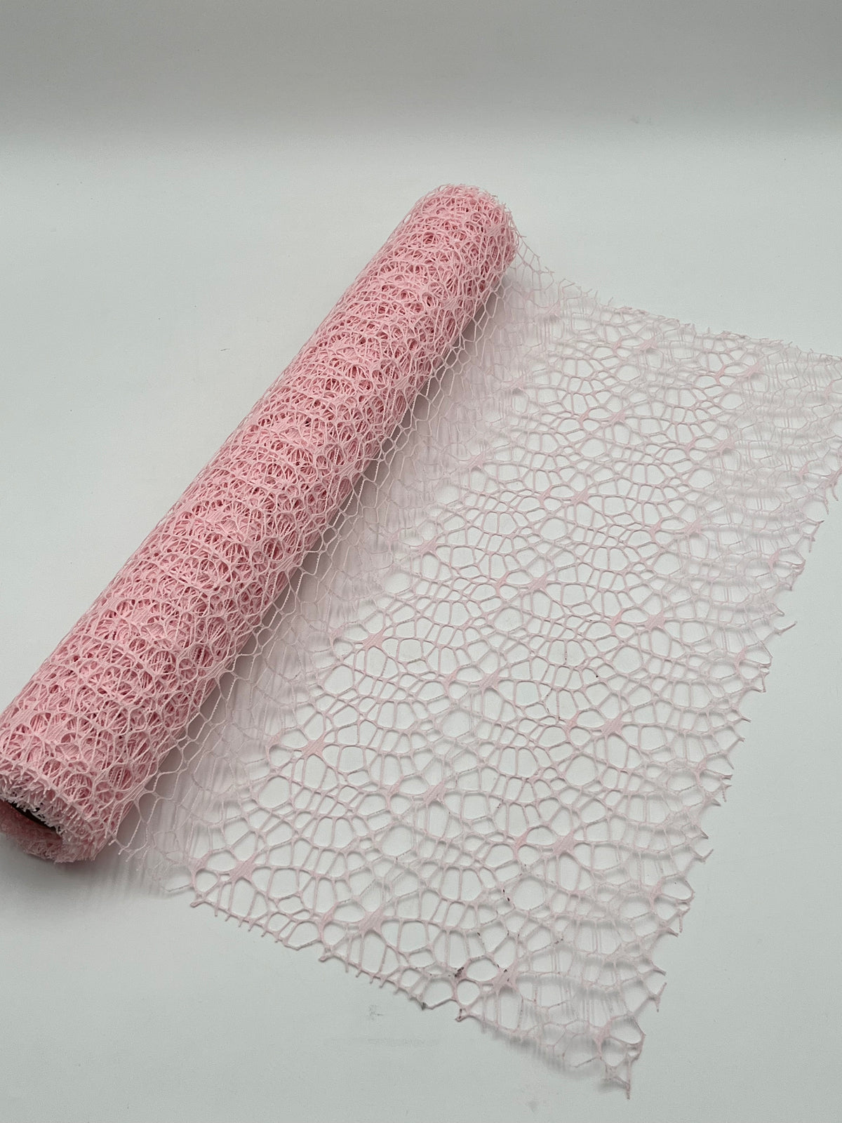 Pink Web Floral Wrapping Paper roll of 20 in. x 5 yards for bouquets gifts crafts and event décor available @ floralsuppliespoint1.com for $12.99