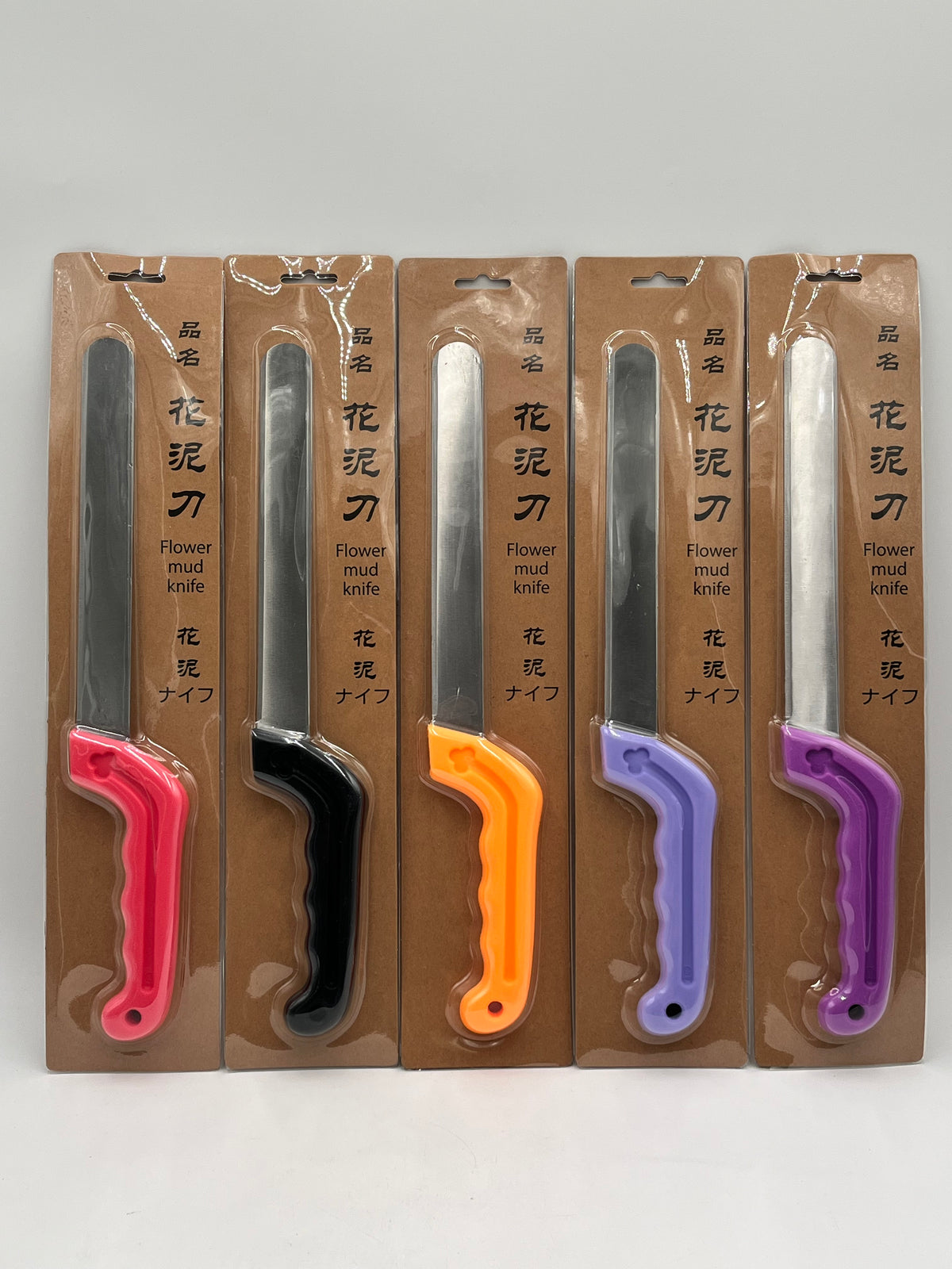 Professional Floral Foam Cutting Knife with red, black, orange, lavender, and purple handles, sold by floralsuppliespoint1.com for $7.99.