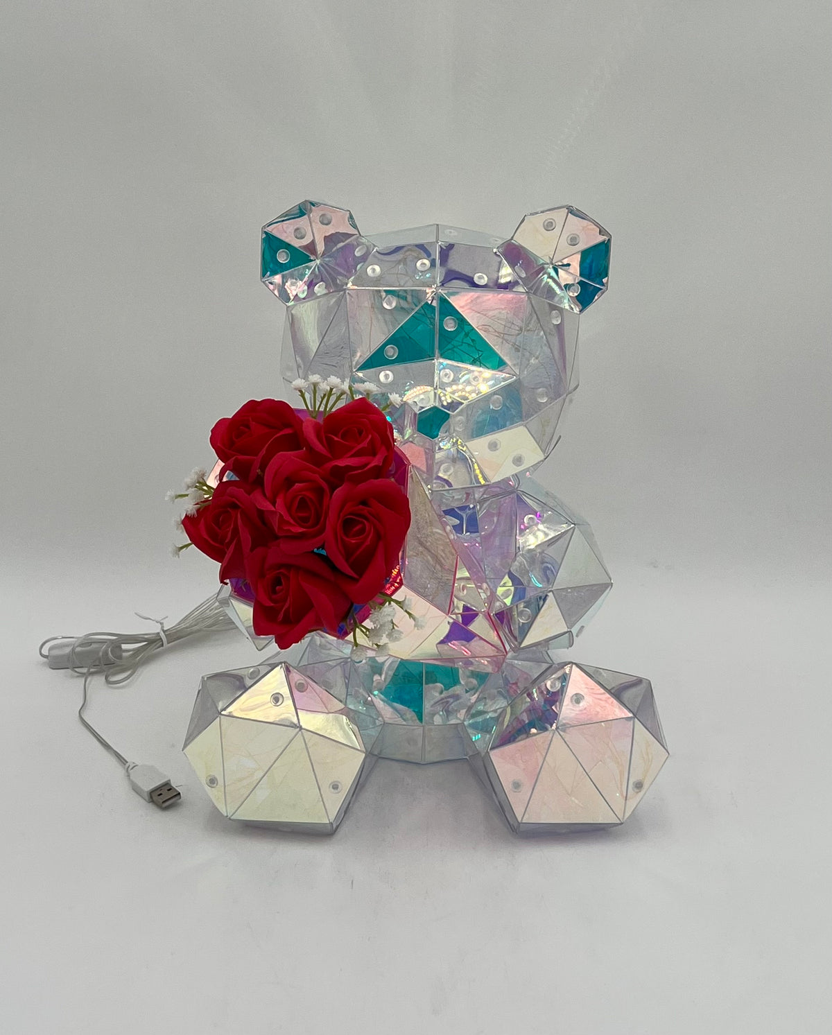 Iridescent light-up Rose Crystal Bear with red roses, USB cable, and pink gift box. Sold by floralsuppliespoint1.com for Individual  $34.99 retail or $160 wholesale for 8-count case.