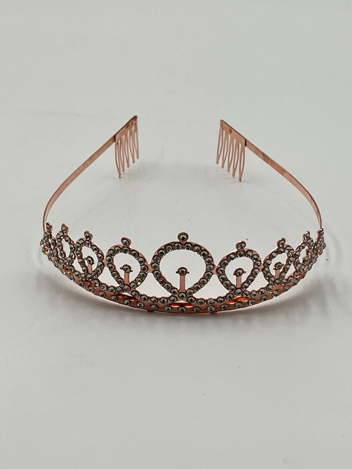Royal Crystal Tiara Headband in gold, rose gold, and silver, sold retail & wholesale by floralsuppliespoint1.com. Ideal for birthdays & celebrations.