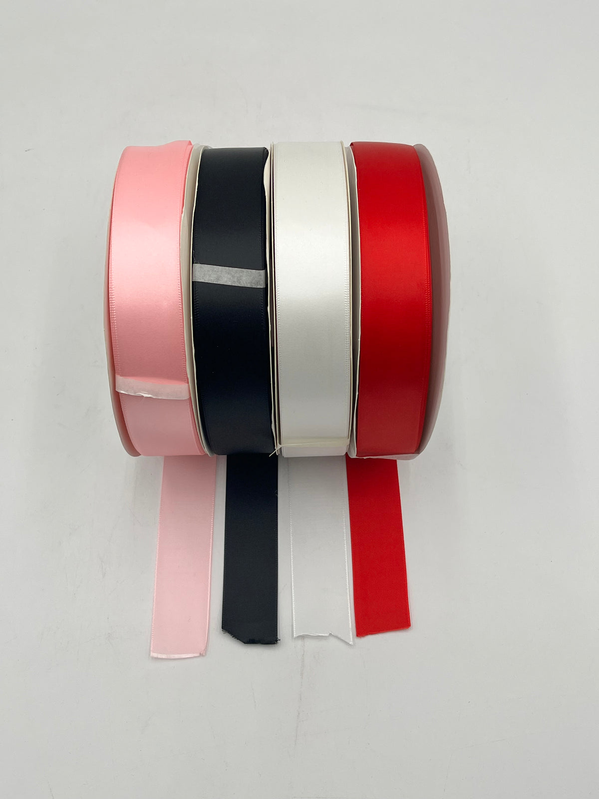 1.25" satin ribbon rolls, 100 yards in Pink, Black, White & Red for florals, crafts & décor. Sold by floralsuppliespoint1.com