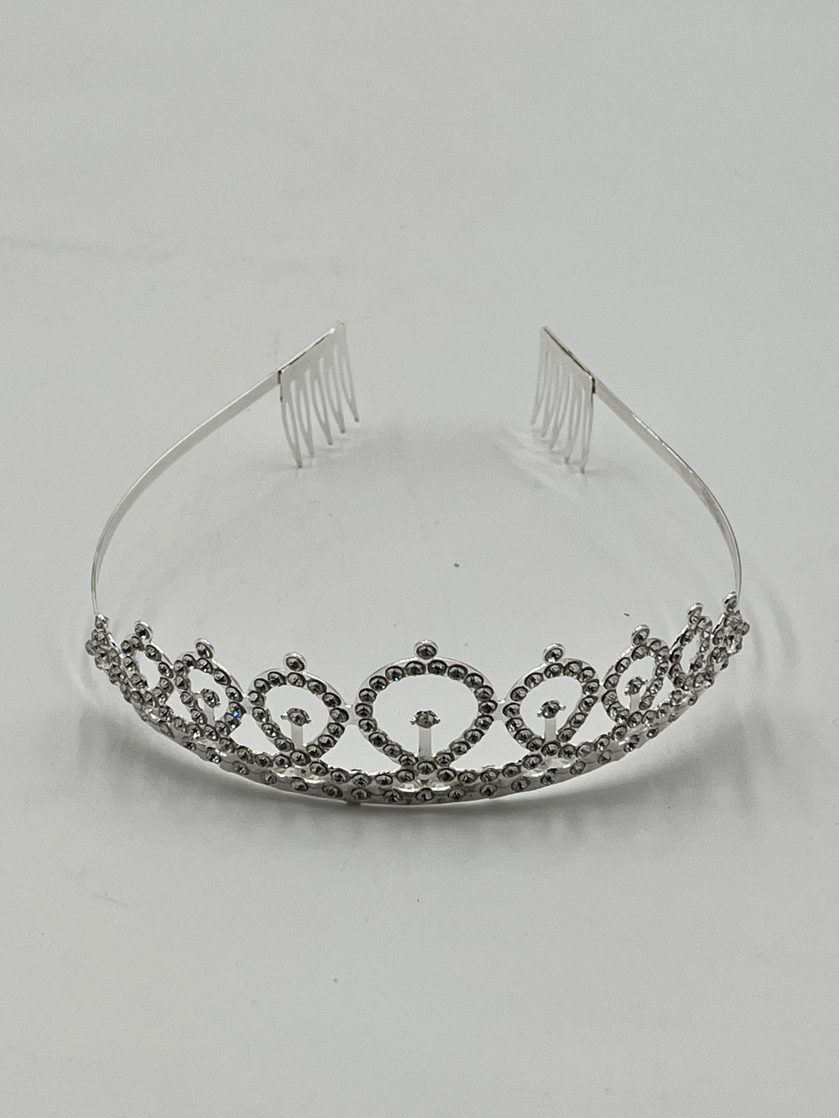 Royal Crystal Tiara Headband in gold, rose gold, and silver, sold retail & wholesale by floralsuppliespoint1.com. Ideal for birthdays & celebrations.