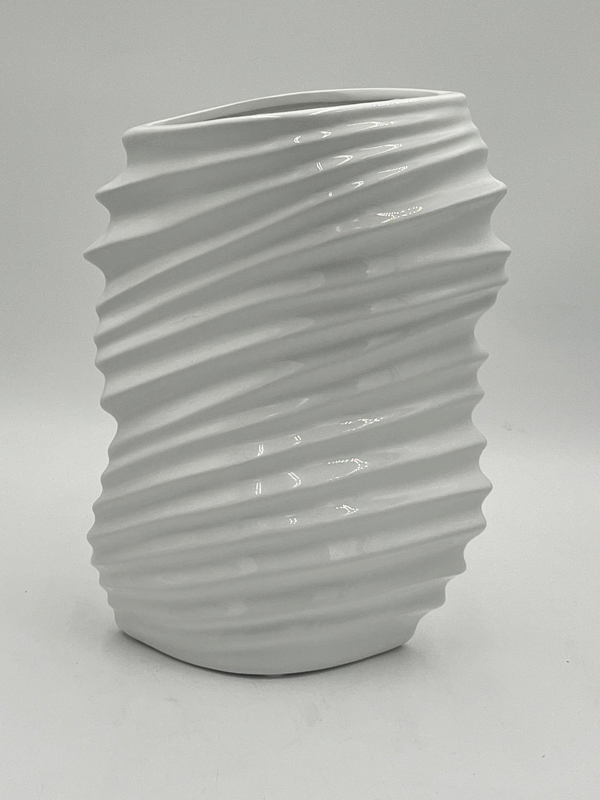 Tidal Crest ceramic vases in gloss white with wave-textured design, sold by floralsuppliespoint1.com. 12" tall, 6" opening, 3 lbs —ideal for contemporary floral displays.