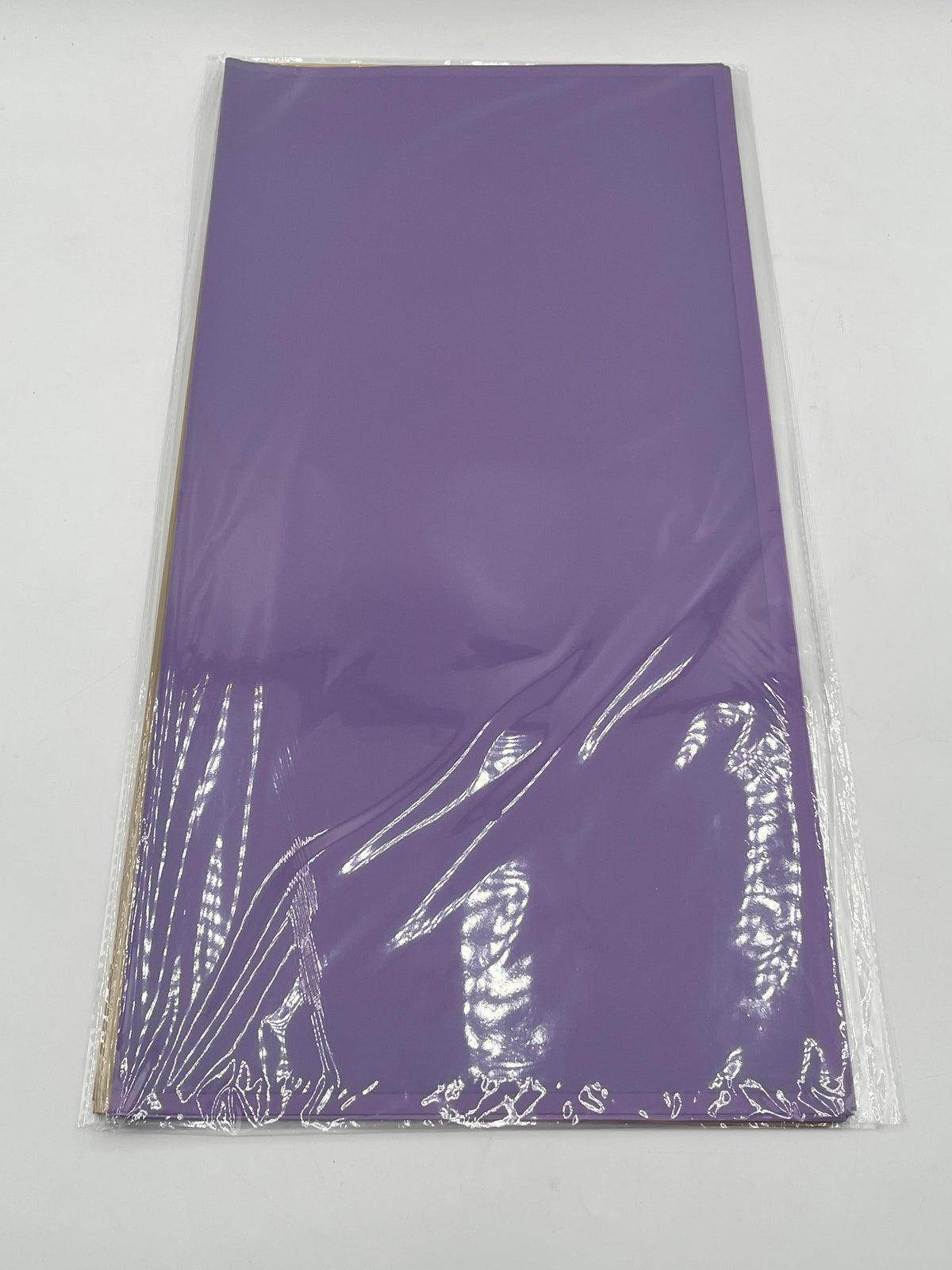 Translucent wrapping papers with 1/4" accent trim in purple color. 20-pack sheets elevate bouquets, gifts & baskets. Sold by floralsuppliespoint1.com for $9.99